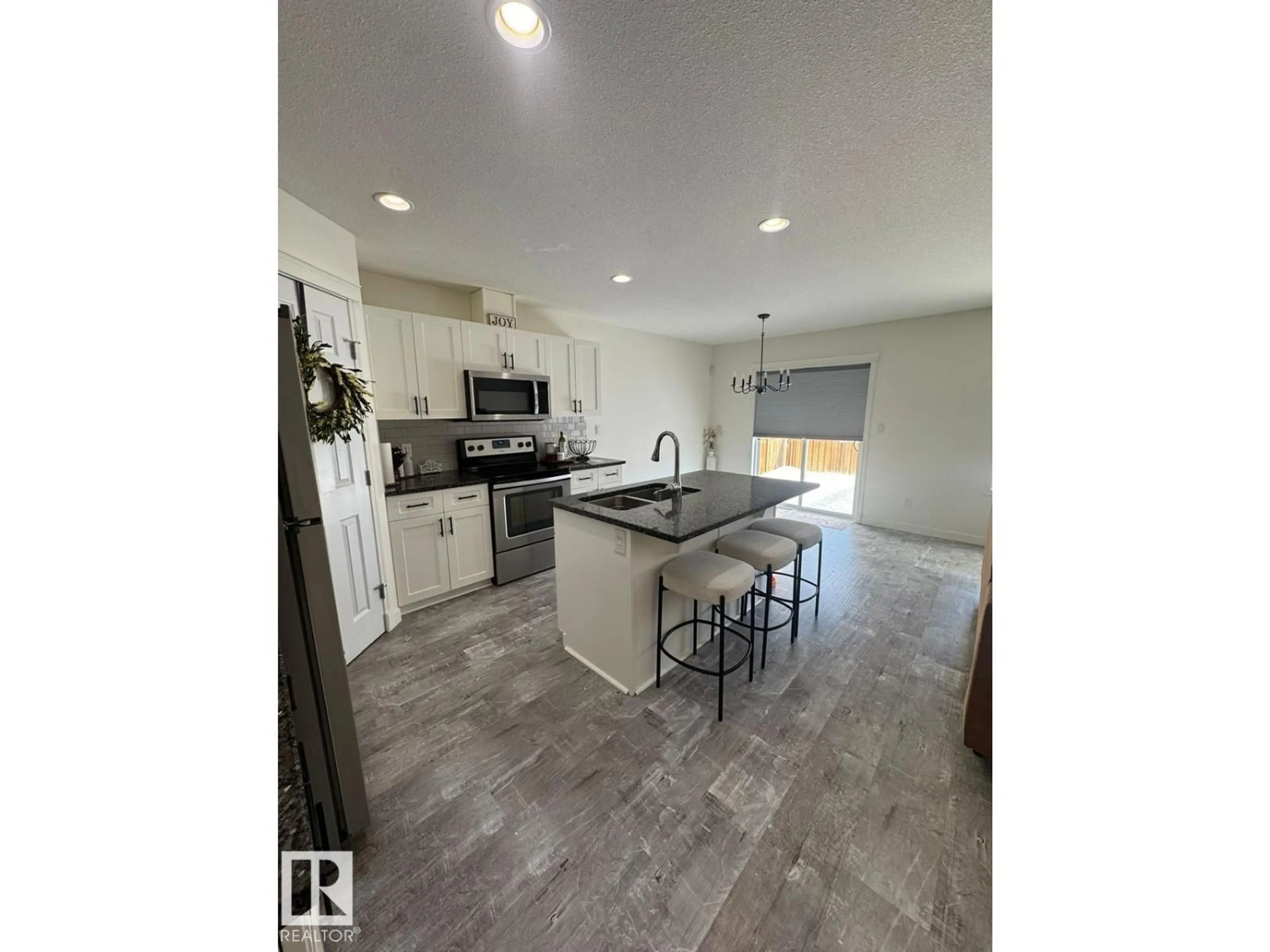 Open concept kitchen, ceramic/tile floor for NW - 17703 65 ST, Edmonton Alberta T5Y3X2