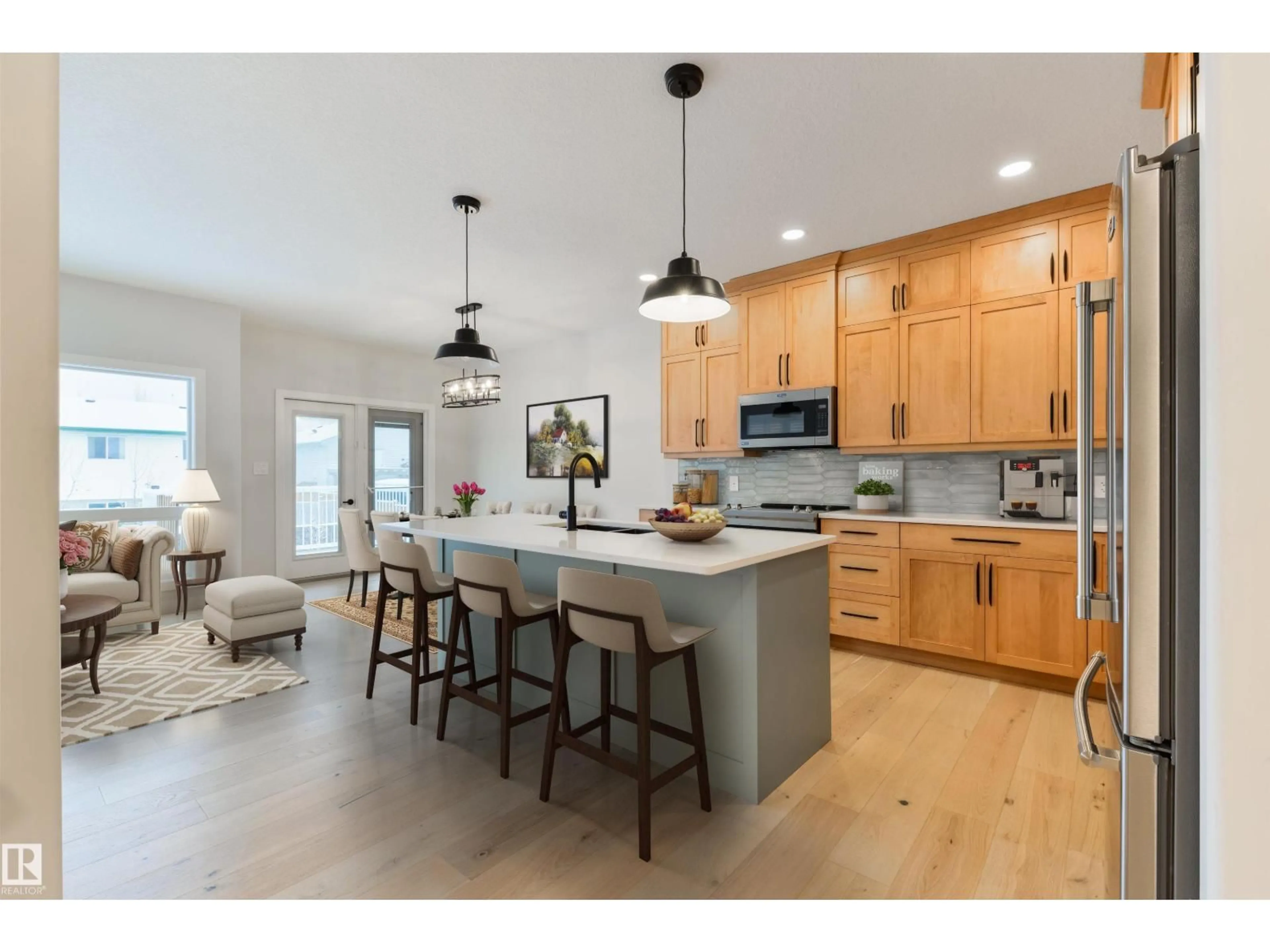 Open concept kitchen, wood/laminate floor for #23 - 1005 CALAHOO RD, Spruce Grove Alberta T7X2T7