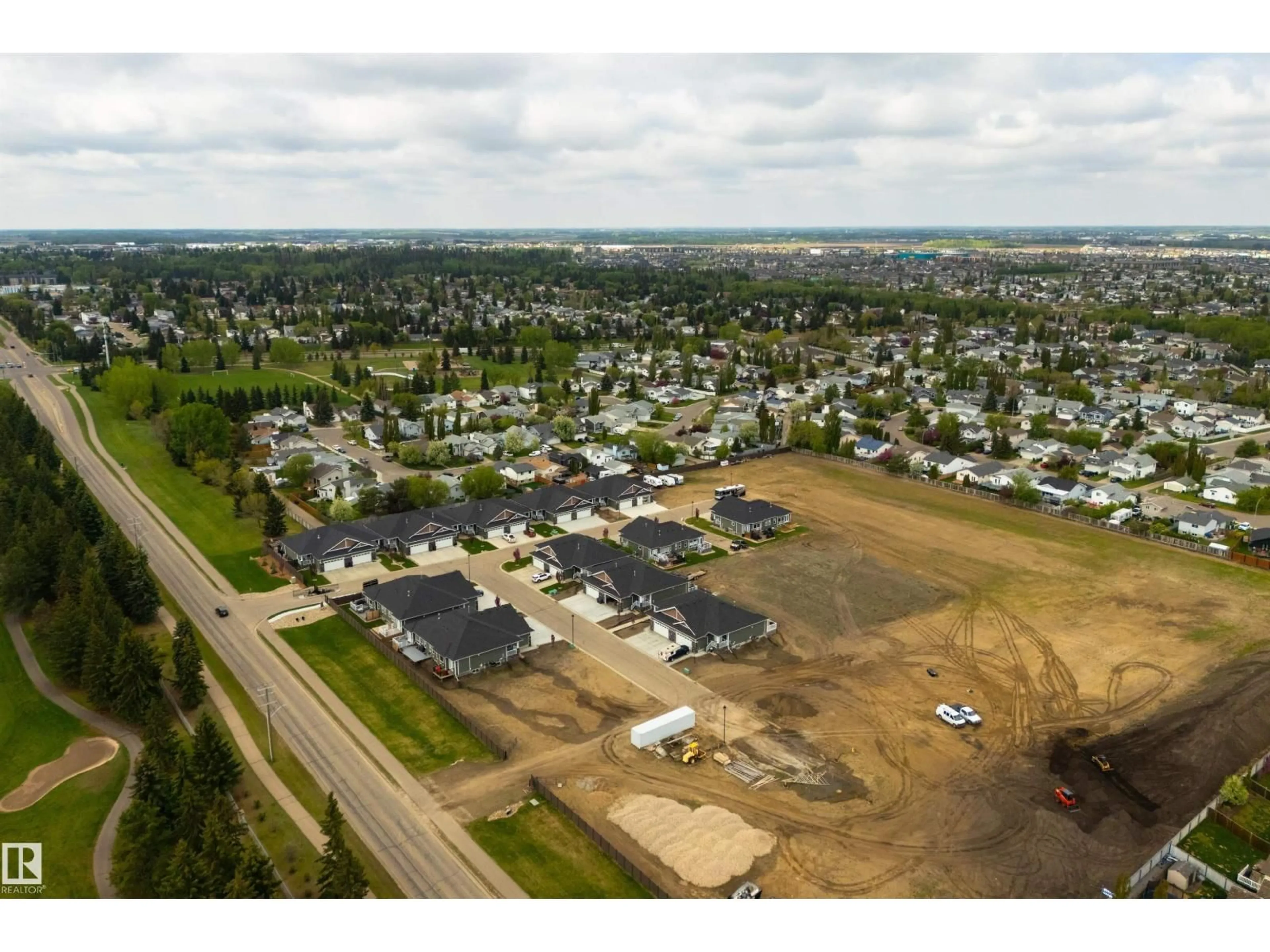 A pic from outside/outdoor area/front of a property/back of a property/a pic from drone, street for 86 - 1005 CALAHOO RD, Spruce Grove Alberta T7X2T7