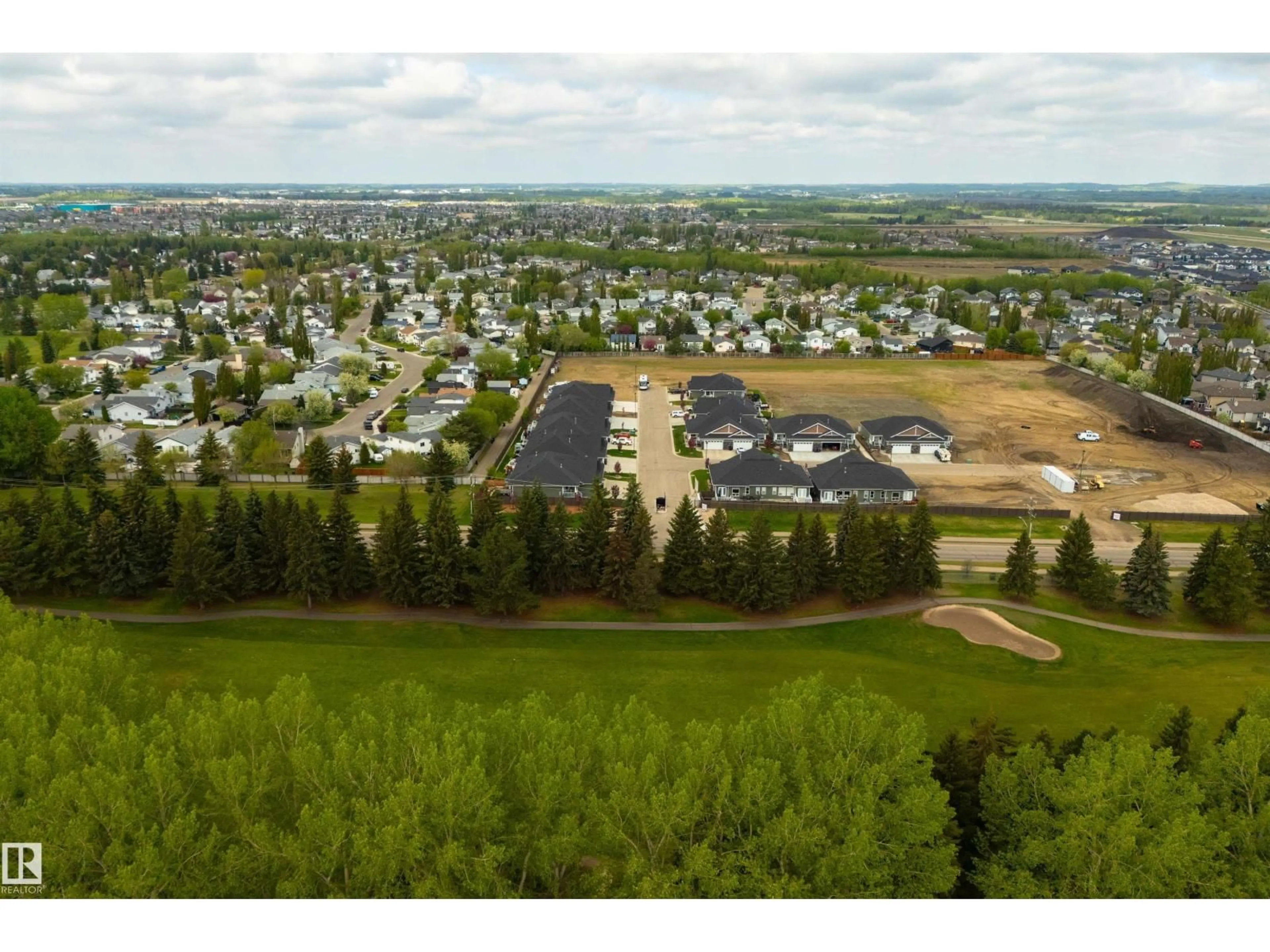 A pic from outside/outdoor area/front of a property/back of a property/a pic from drone, mountain view for #88 - 1005 CALAHOO RD, Spruce Grove Alberta T7X2T7