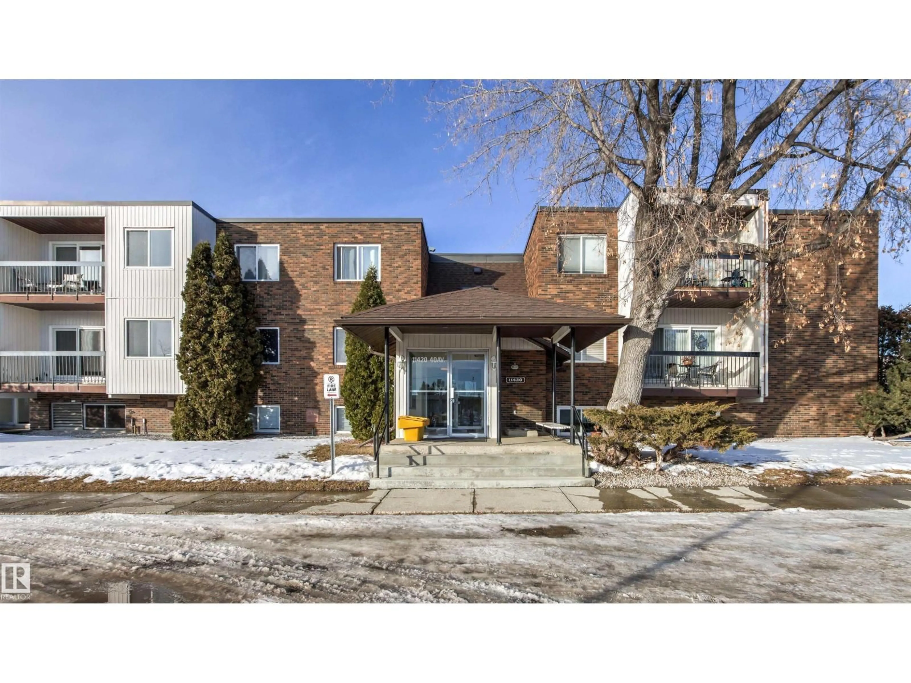 Home with brick exterior material, street for 304 - 11420 40 AV, Edmonton Alberta T6J0R5