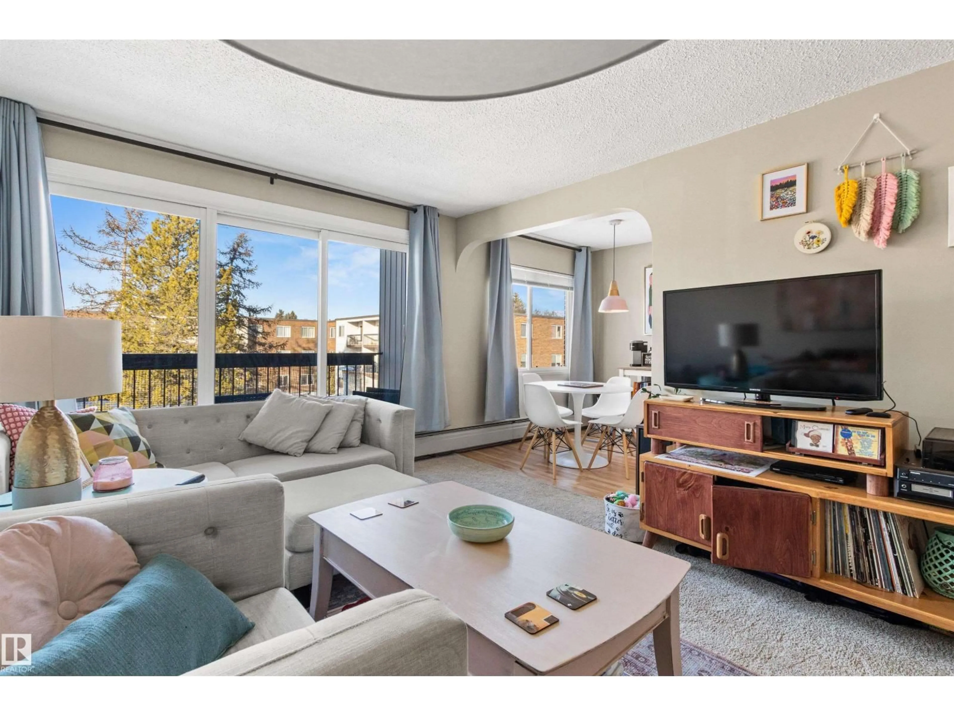 Living room with furniture, unknown for 304 - 11420 40 AV, Edmonton Alberta T6J0R5