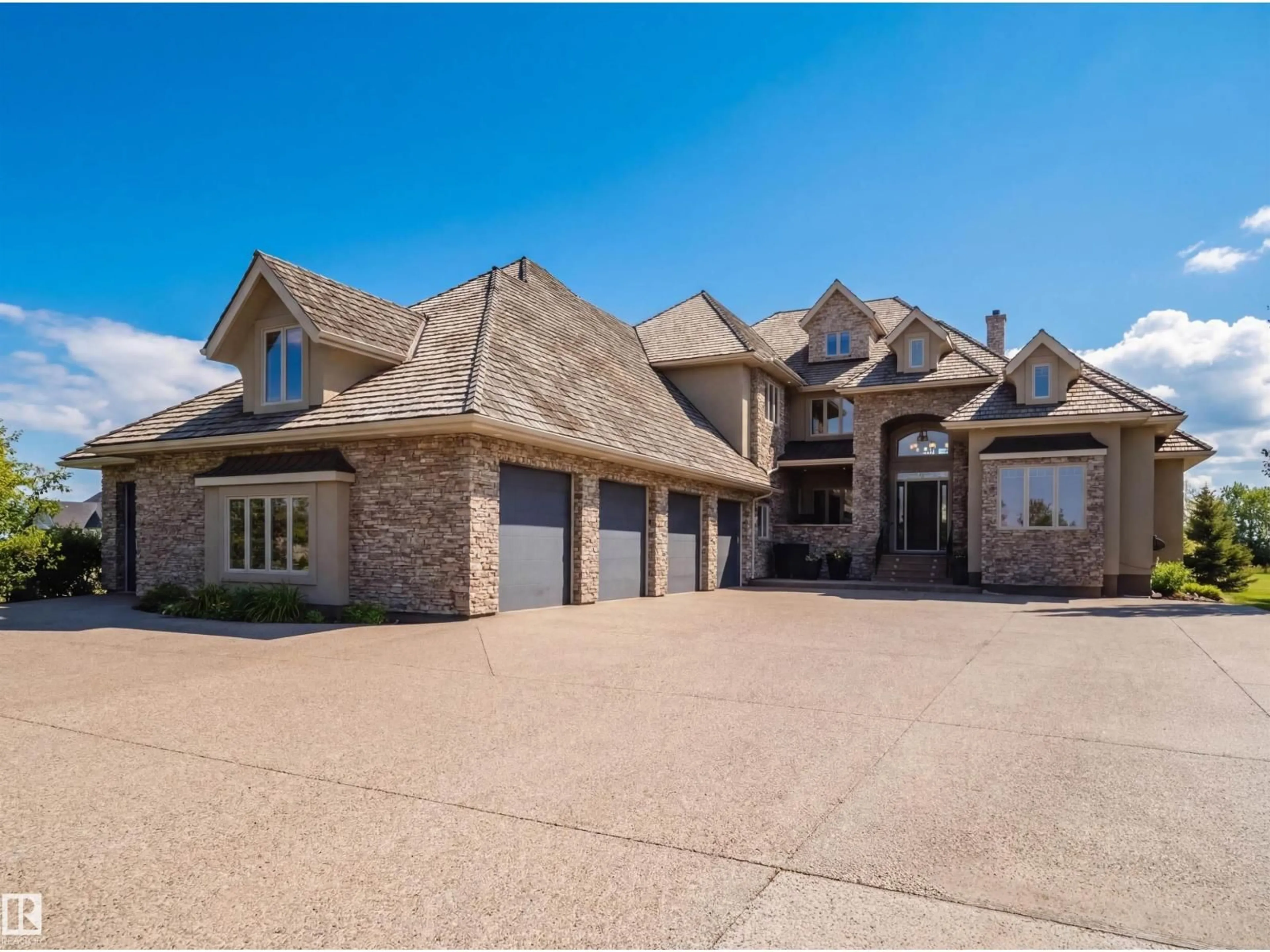 Home with brick exterior material, street for #11 - 25515 TWP ROAD 511A, Rural Parkland County Alberta T7Y1A8