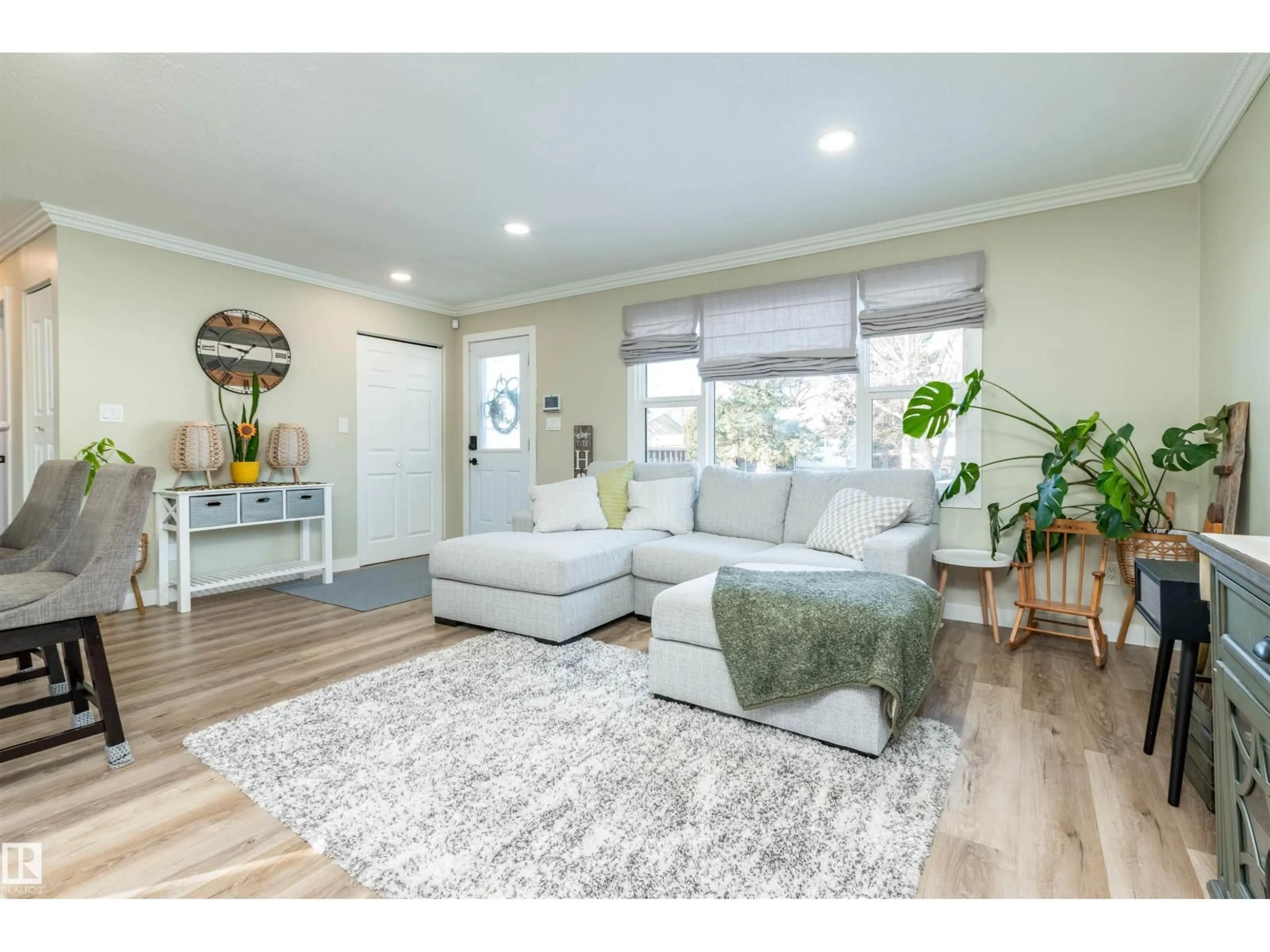 Living room with furniture, wood/laminate floor for 24 CIRCLEWOOD DR, Sherwood Park Alberta T8A0K6
