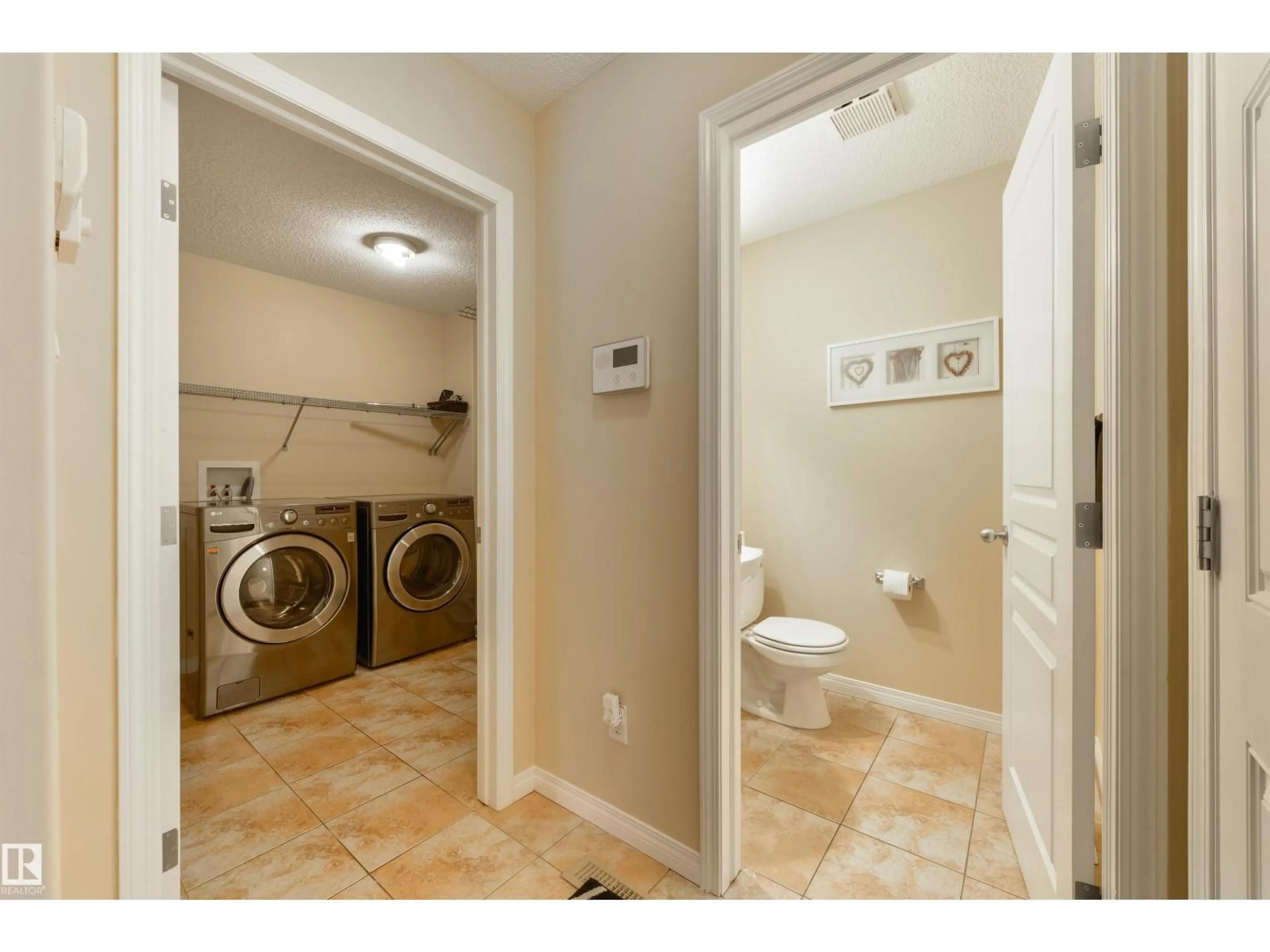 Laundry room for 20624 92 AV NW, Edmonton Alberta T5T1S9