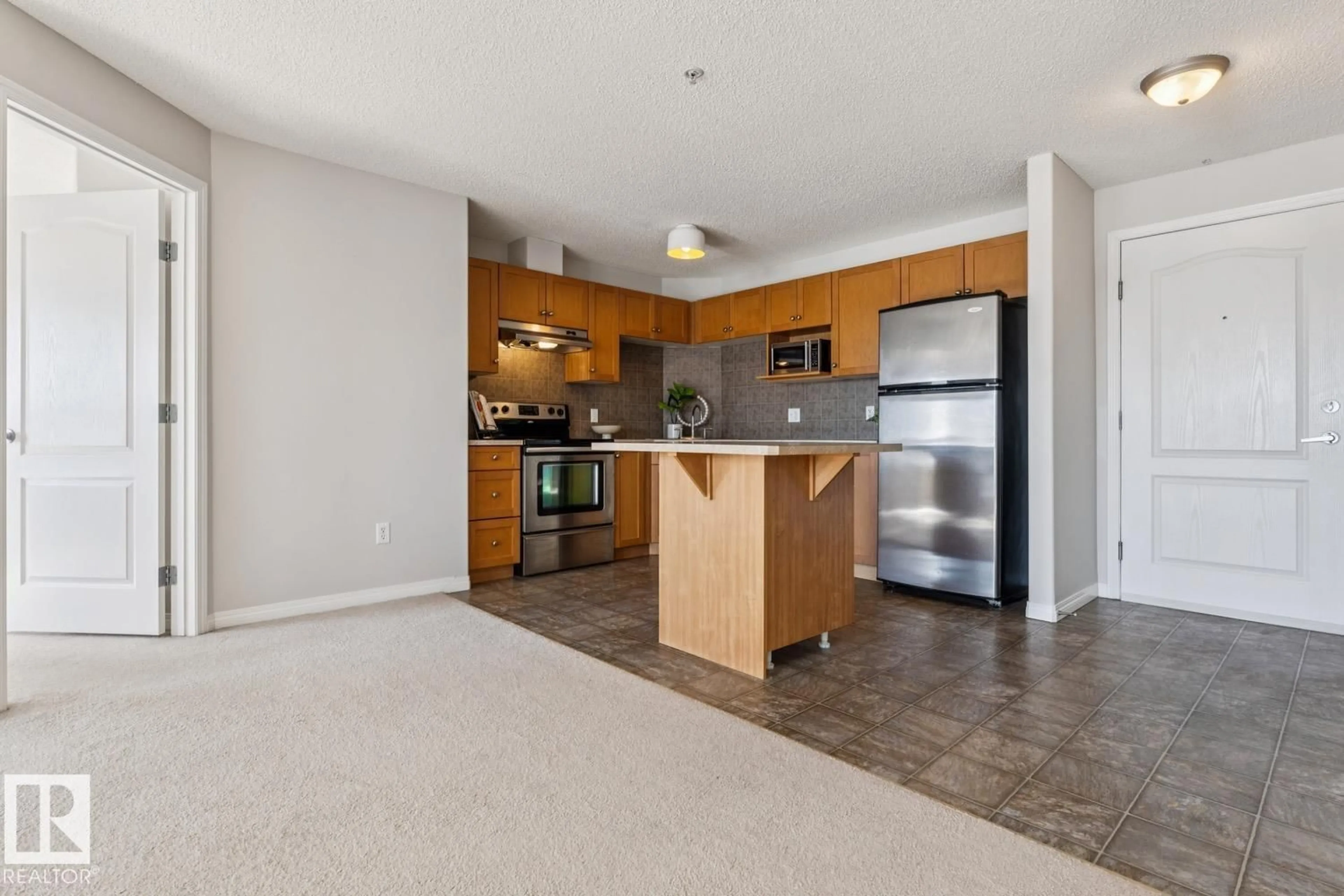 Open concept kitchen, unknown for 9363 - 1320 SIMPSON DR, Edmonton Alberta T6R0N2