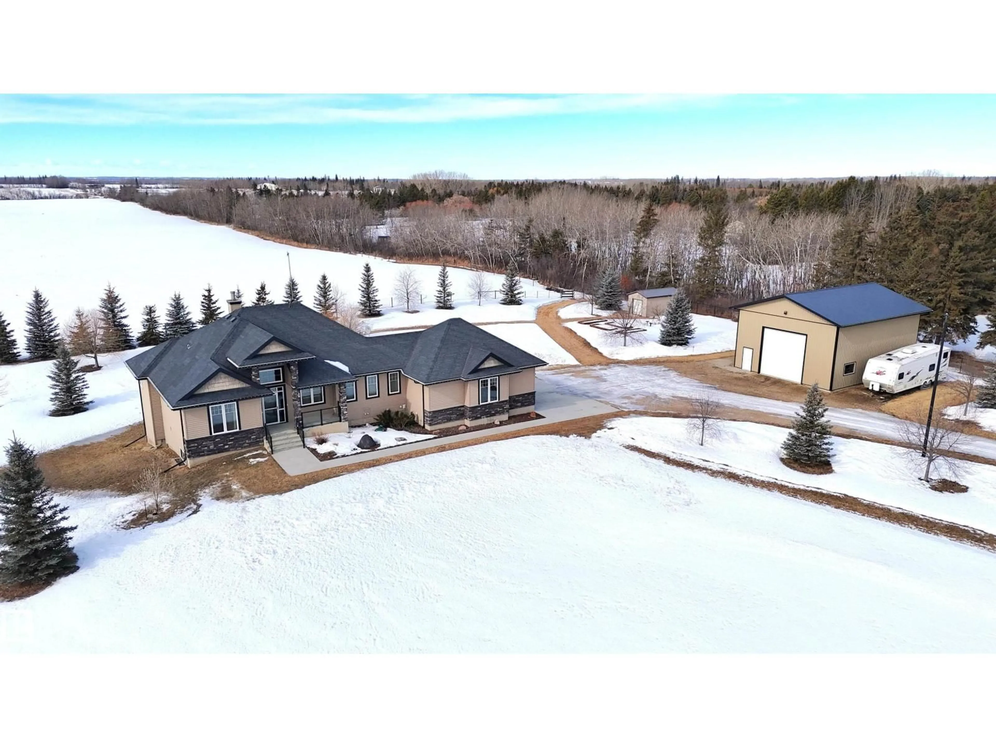 A pic from outside/outdoor area/front of a property/back of a property/a pic from drone, unknown for 51016 RGE ROAD 270, Rural Parkland County Alberta T7Y1G8