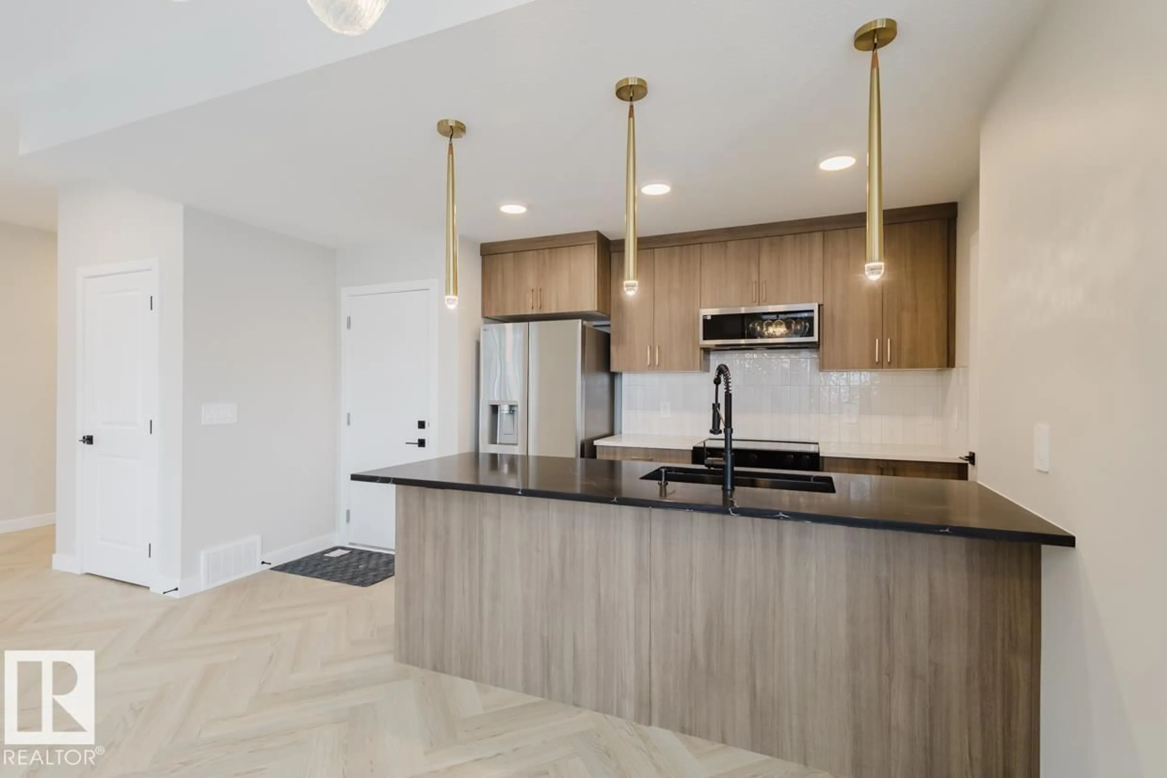 Open concept kitchen, ceramic/tile floor for #4 - 16231 19 AV, Edmonton Alberta T6W5C6