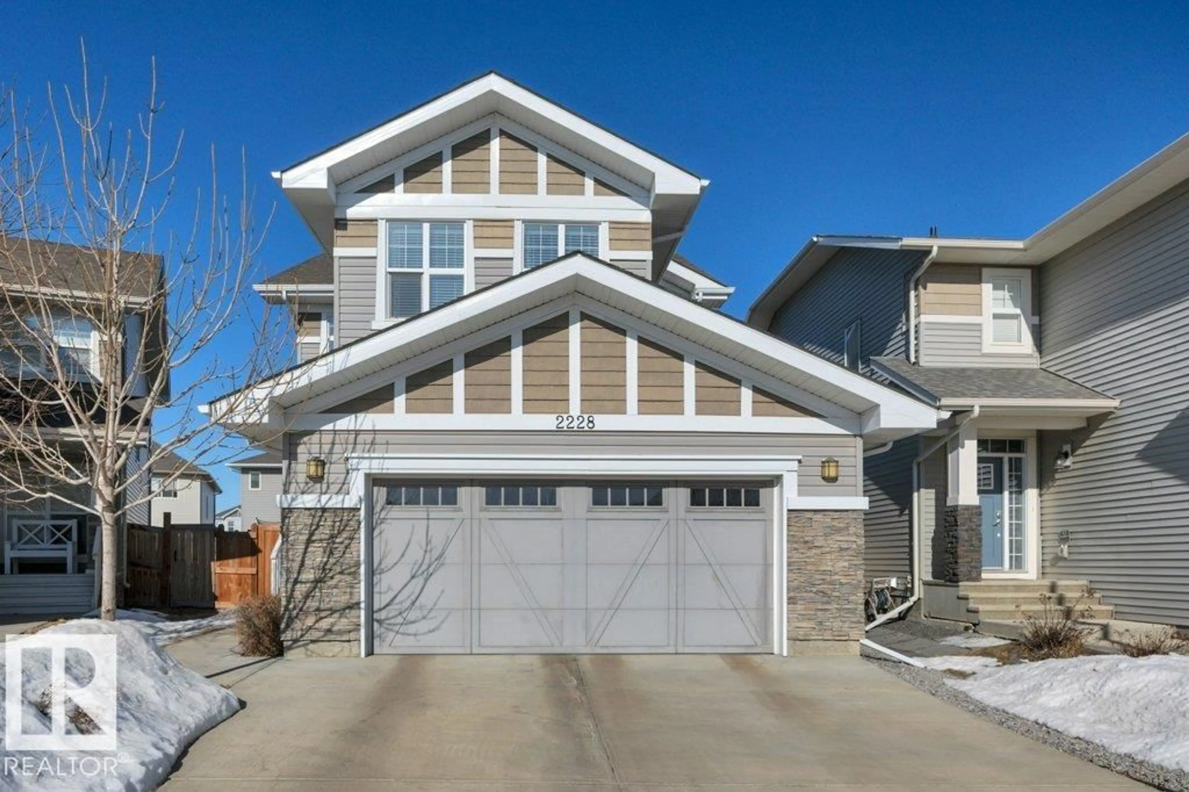 Home with vinyl exterior material, street for SW - 2228 CALHOUN LI, Edmonton Alberta T6W3E1