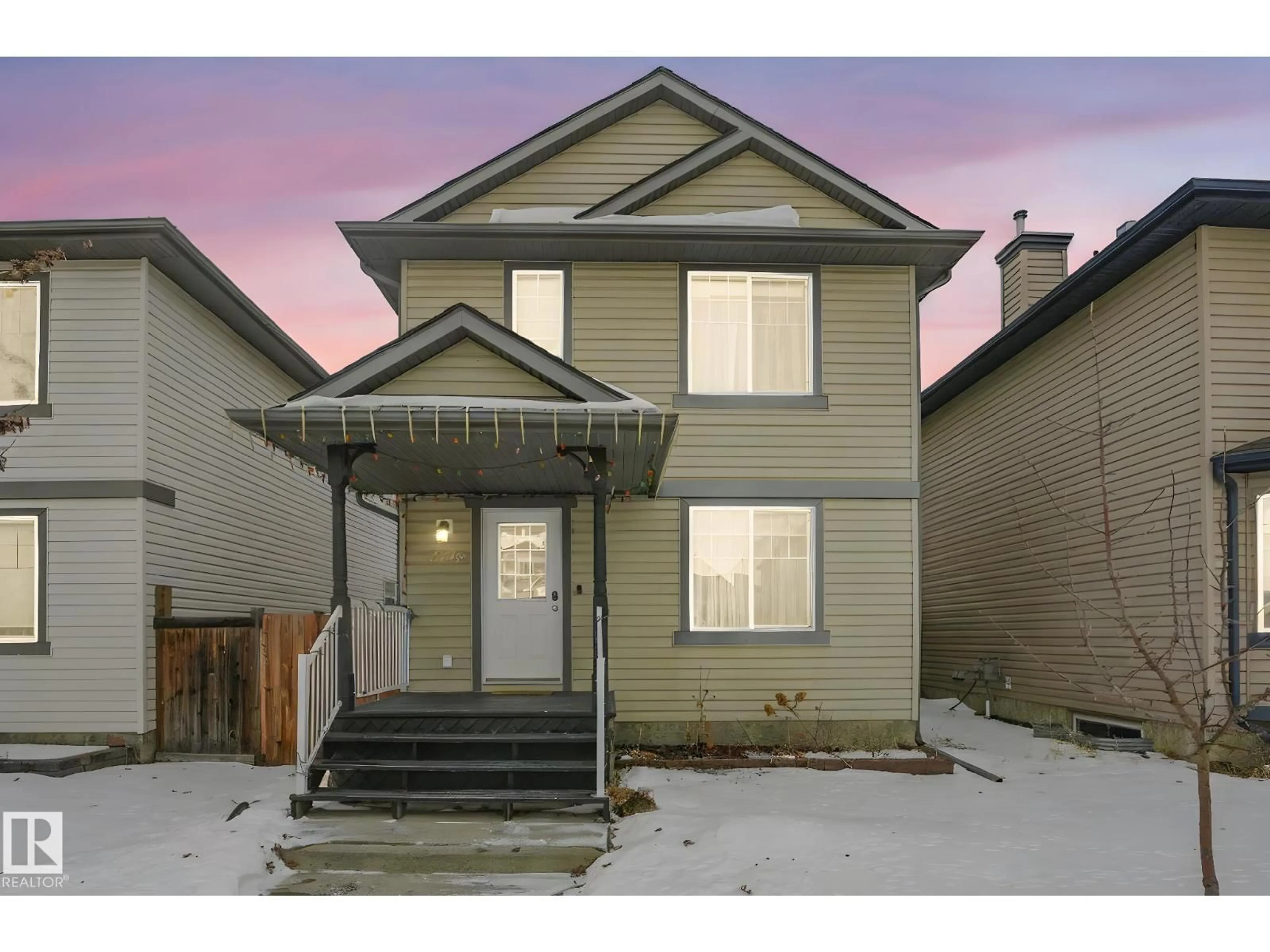 Home with vinyl exterior material, street for NW - 2348 28B AV, Edmonton Alberta T6T2A4