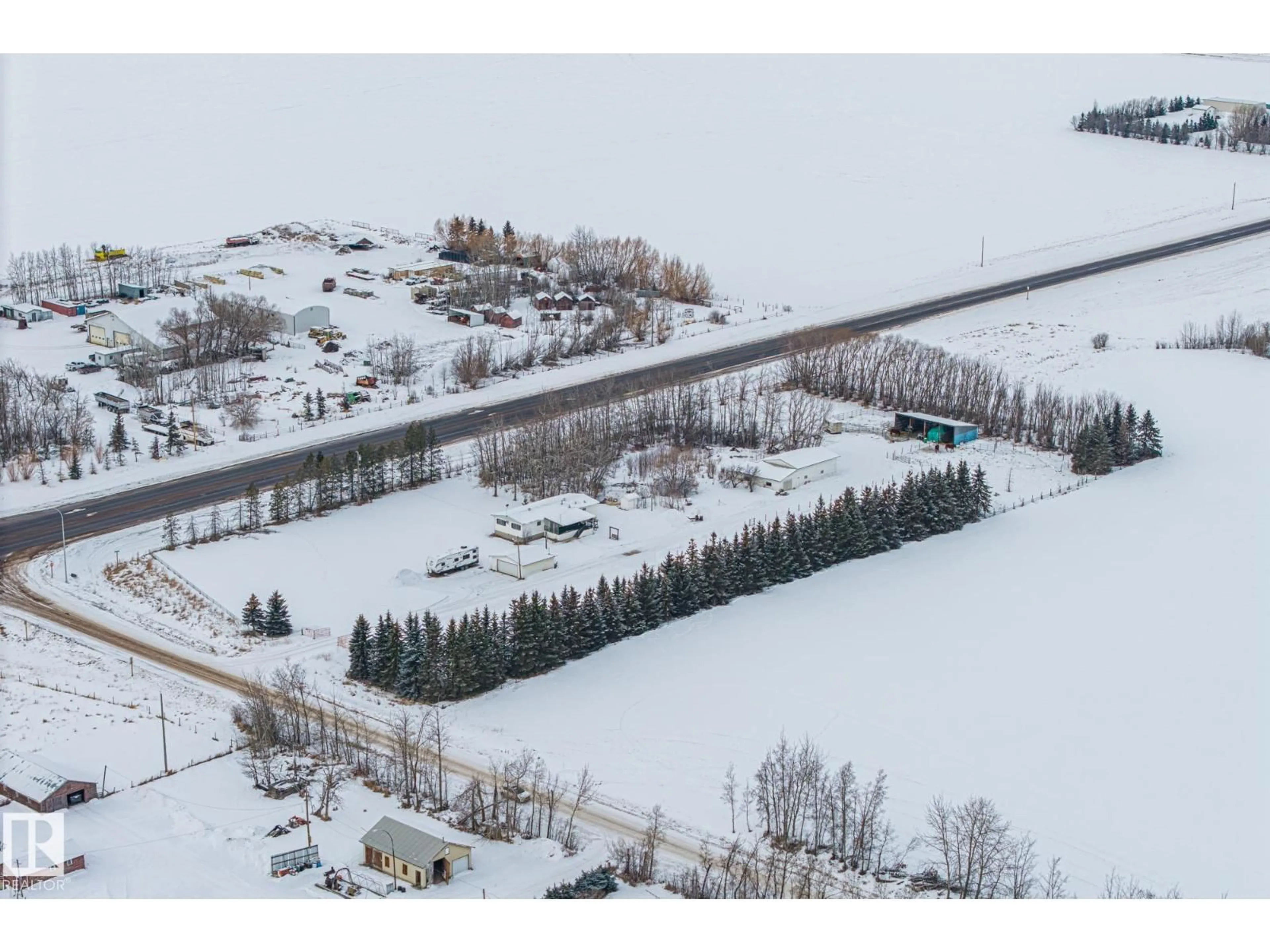A pic from outside/outdoor area/front of a property/back of a property/a pic from drone, mountain view for 26332 TWP ROAD 594, Rural Westlock County Alberta T7P2P5