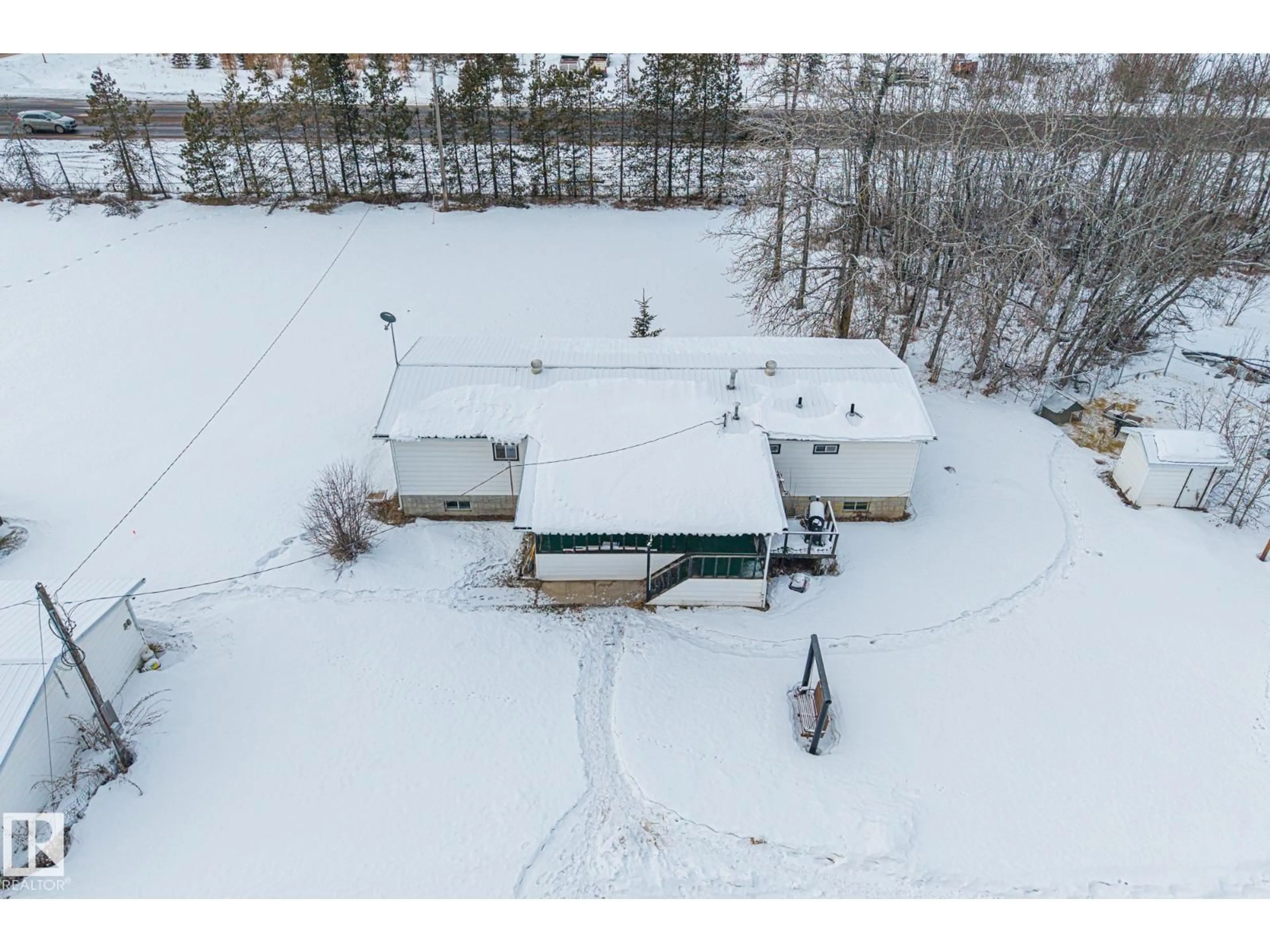 A pic from outside/outdoor area/front of a property/back of a property/a pic from drone, unknown for 26332 TWP ROAD 594, Rural Westlock County Alberta T7P2P5