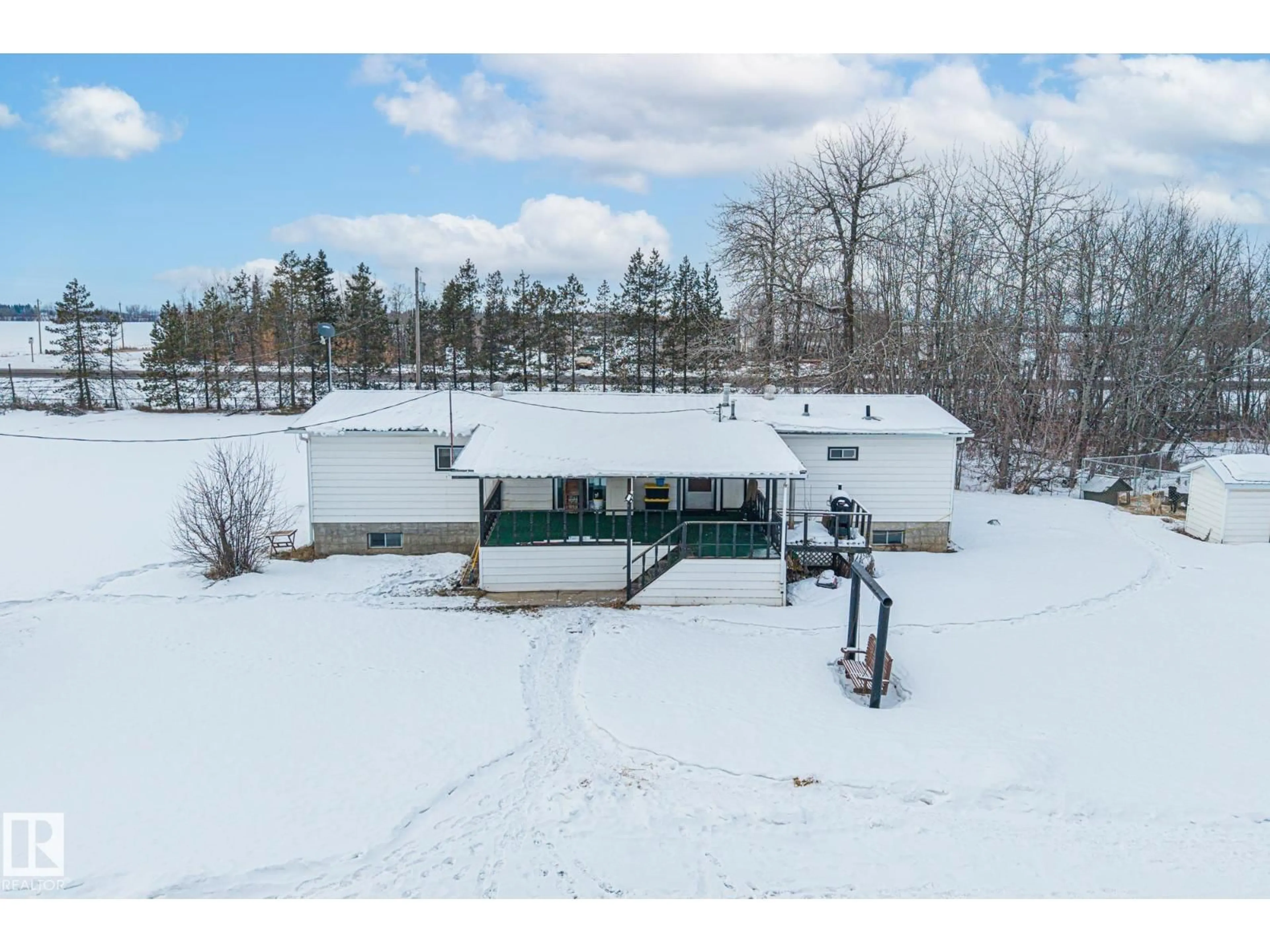 A pic from outside/outdoor area/front of a property/back of a property/a pic from drone, water/lake/river/ocean view for 26332 TWP ROAD 594, Rural Westlock County Alberta T7P2P5