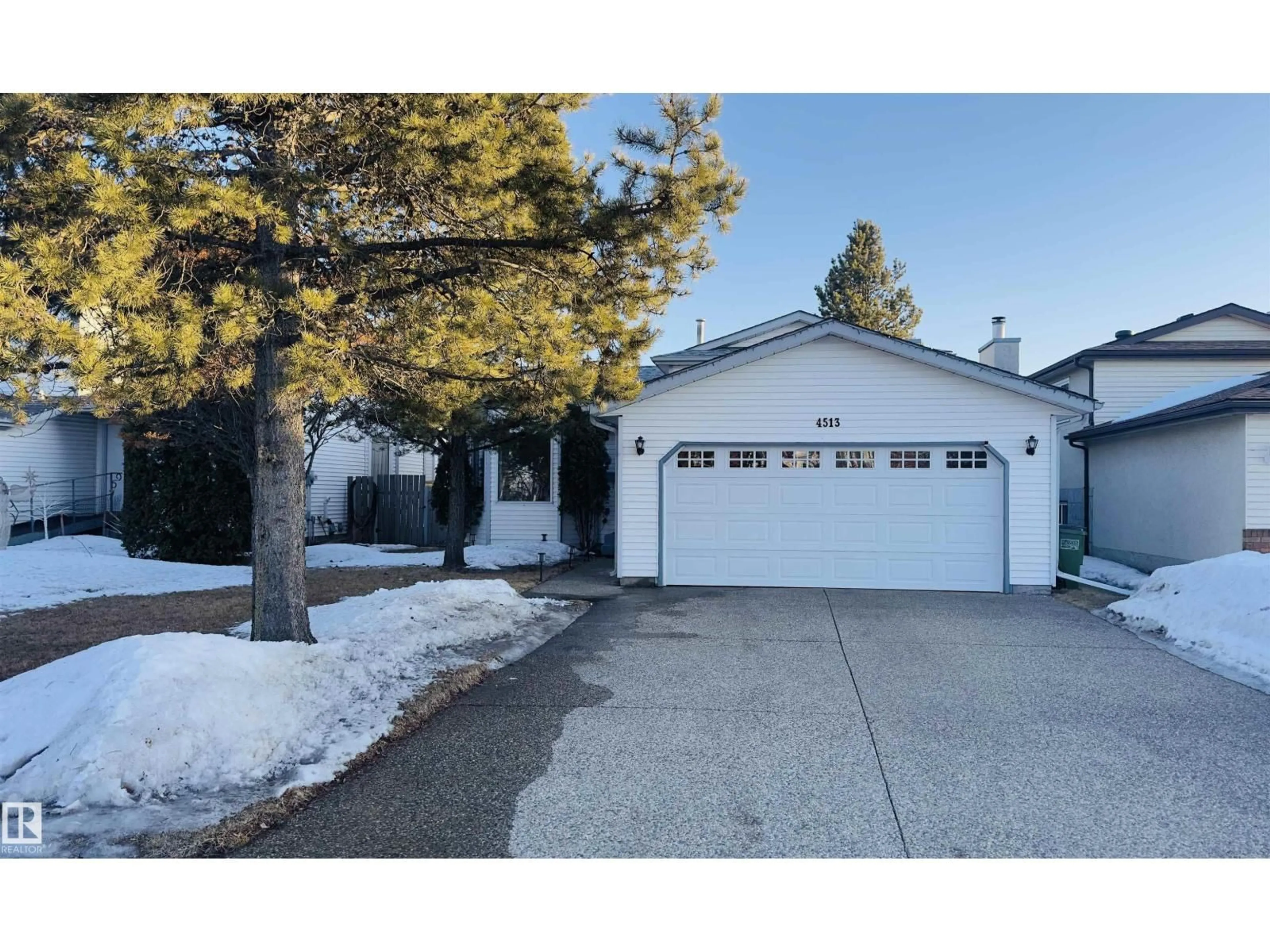 Home with vinyl exterior material, street for 4513 10 AV, Edmonton Alberta T6L4S2