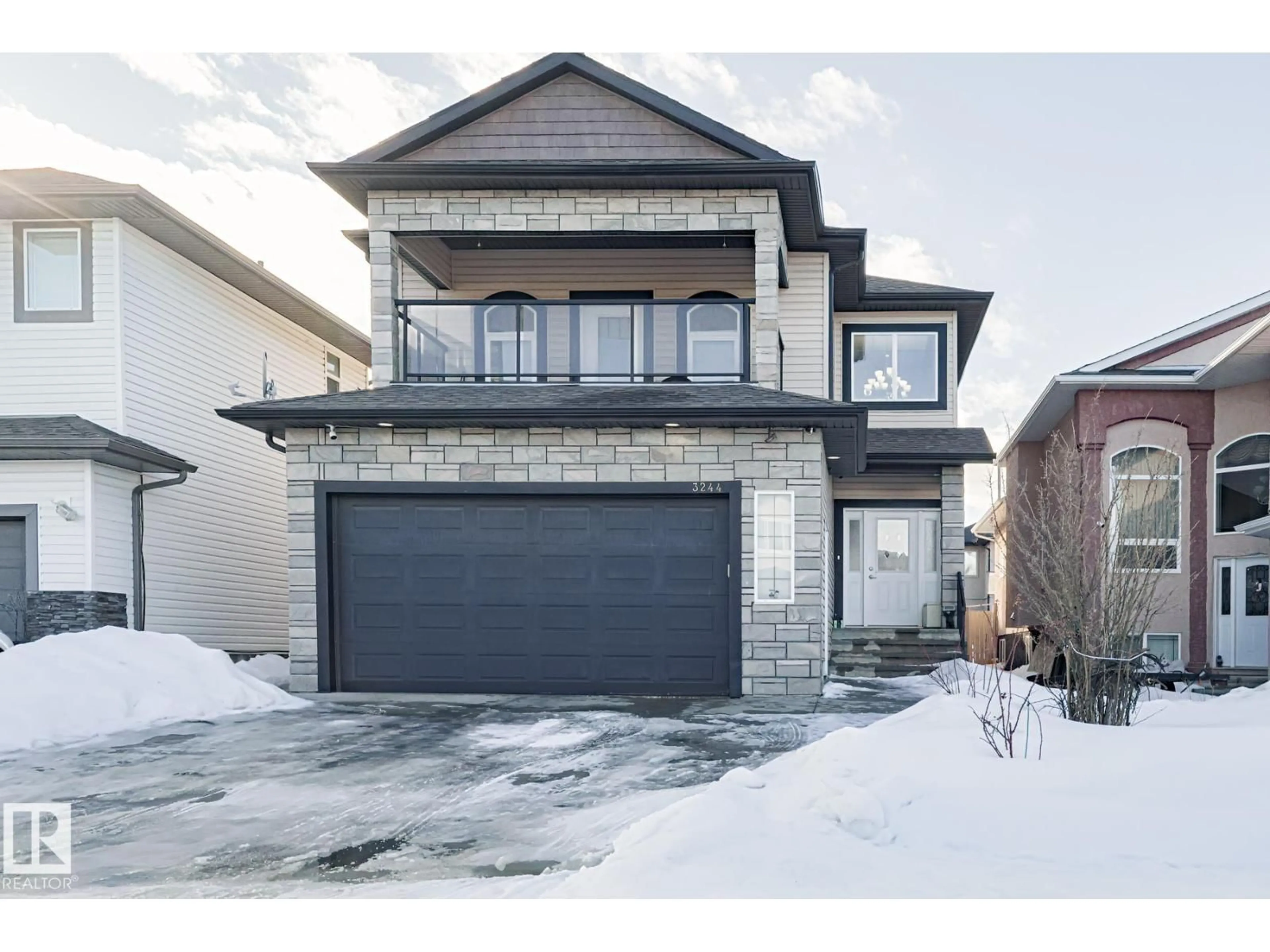 Home with brick exterior material, street for NW - 3244 18 ST, Edmonton Alberta T6T0H2