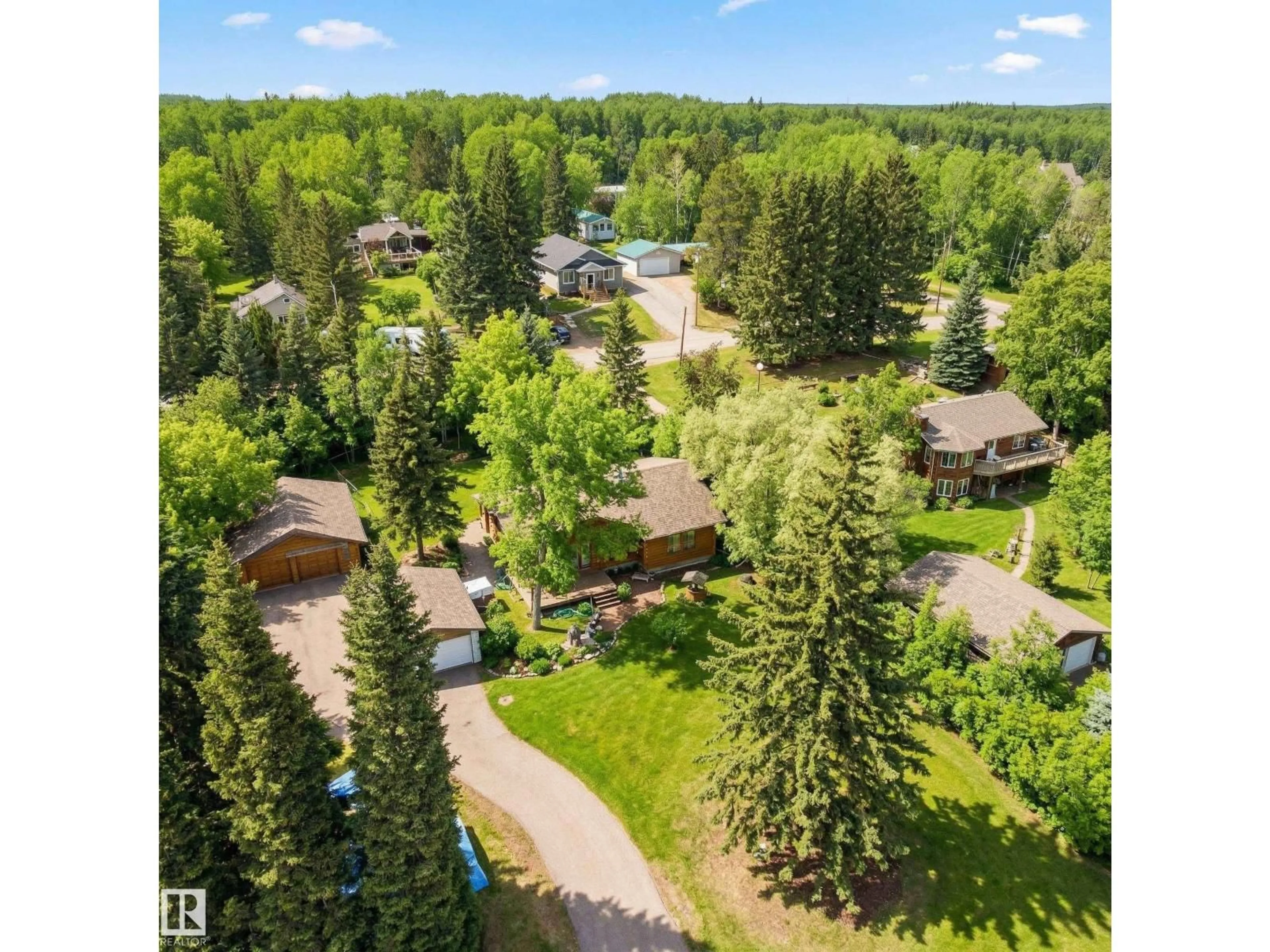 A pic from outside/outdoor area/front of a property/back of a property/a pic from drone, forest/trees view for 4521 - 128 LAKESHORE RD, Rural Parkland County Alberta T0E2K0
