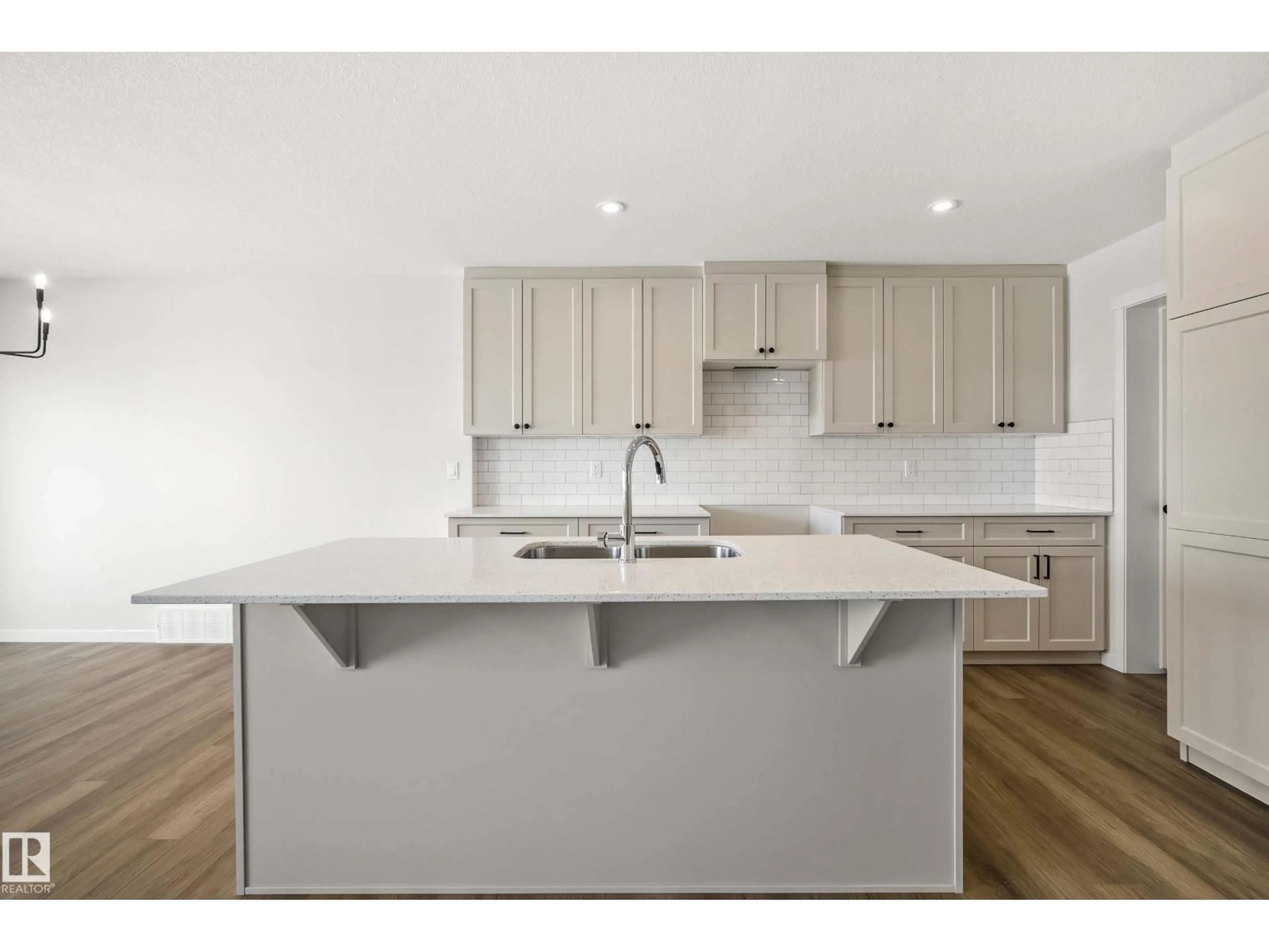 Open concept kitchen, wood/laminate floor for 344 172 AV, Edmonton Alberta T5Y4K9