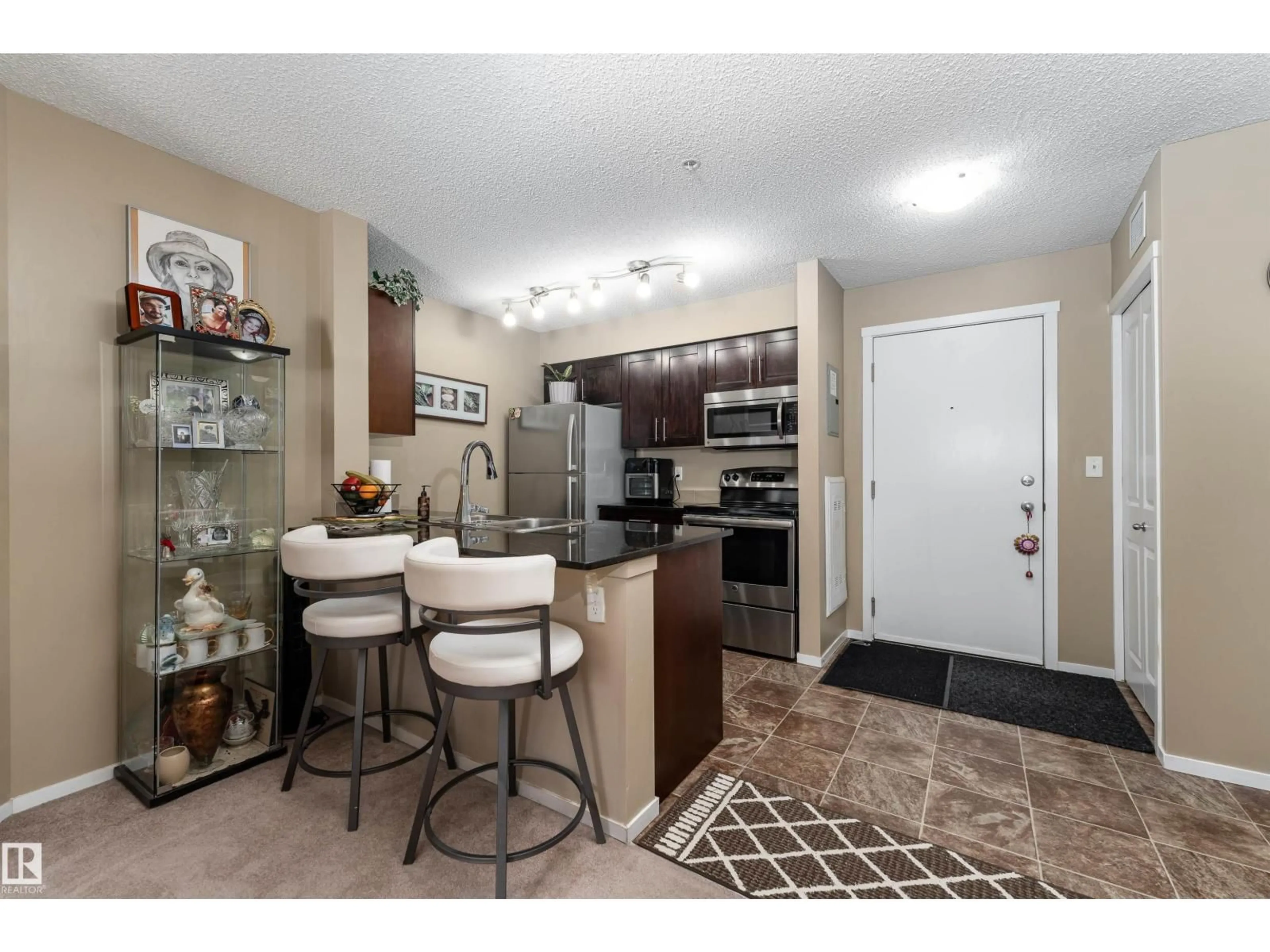 Open concept kitchen, unknown for #111 - 5370 CHAPPELLE RD, Edmonton Alberta T6W3L5