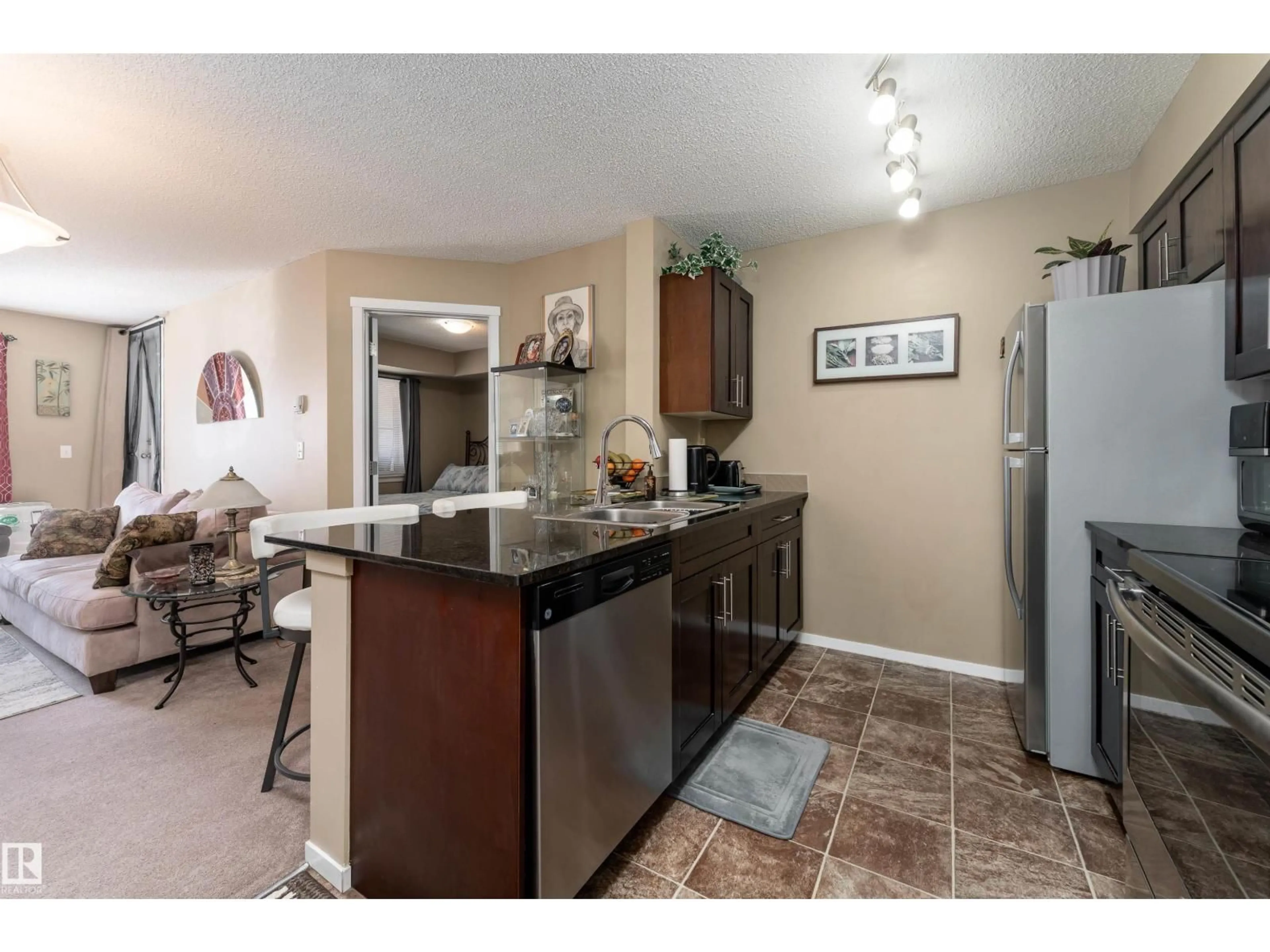 Open concept kitchen, unknown for #111 - 5370 CHAPPELLE RD, Edmonton Alberta T6W3L5