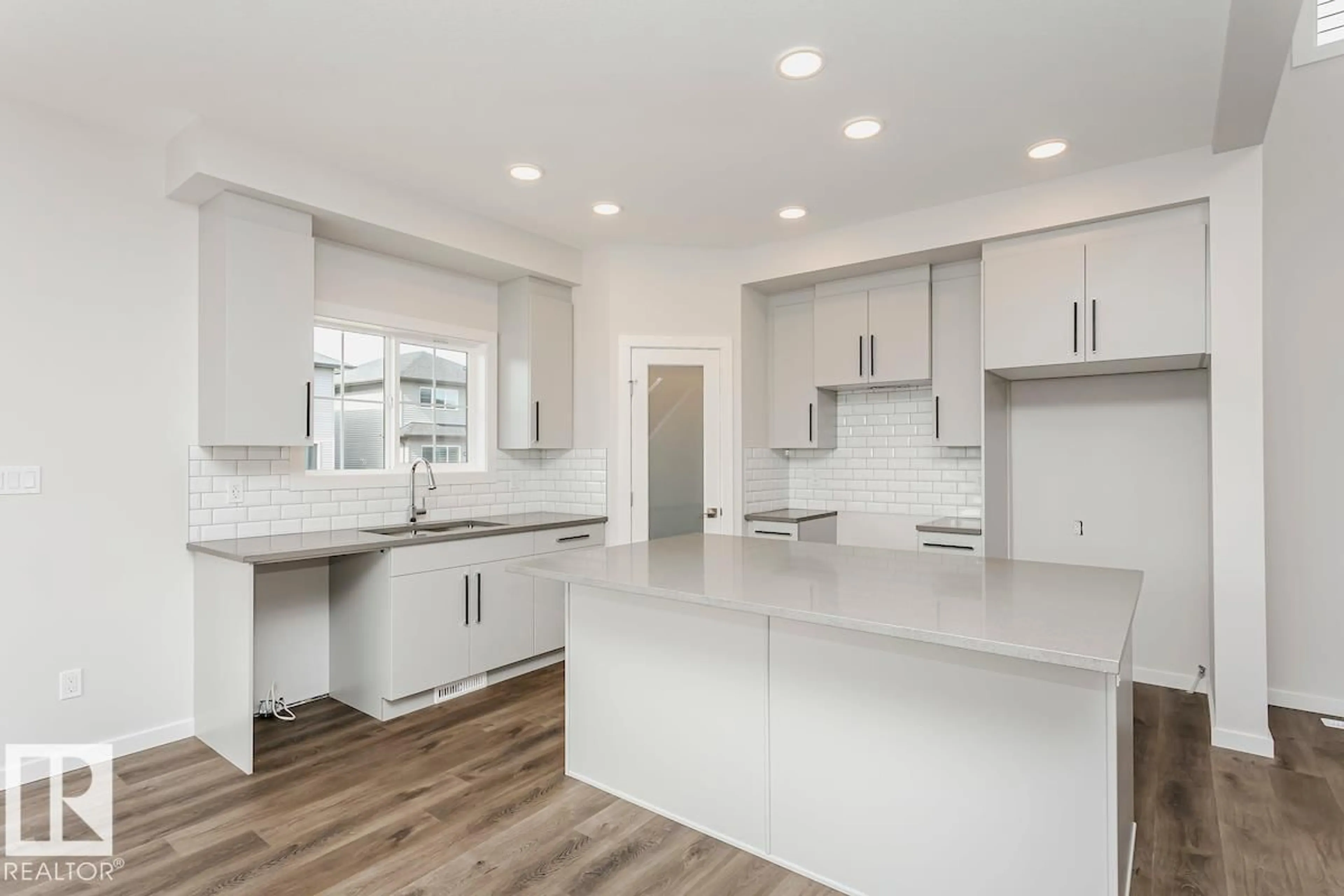 Open concept kitchen, ceramic/tile floor for 17408 2 ST, Edmonton Alberta T5Y4G6