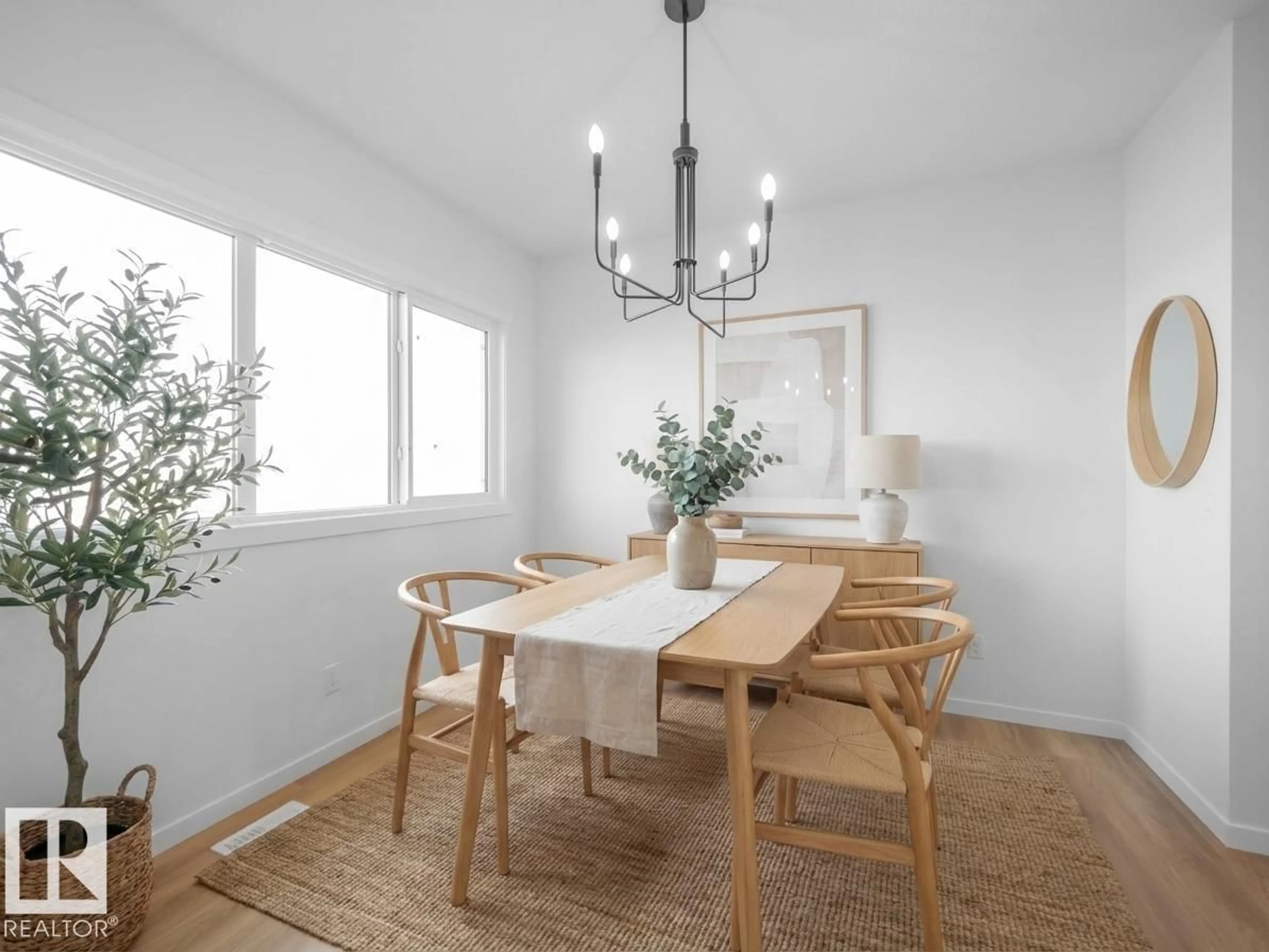 Dining room, wood/laminate floor for NW - 19422 22A AV, Edmonton Alberta T6M3J2