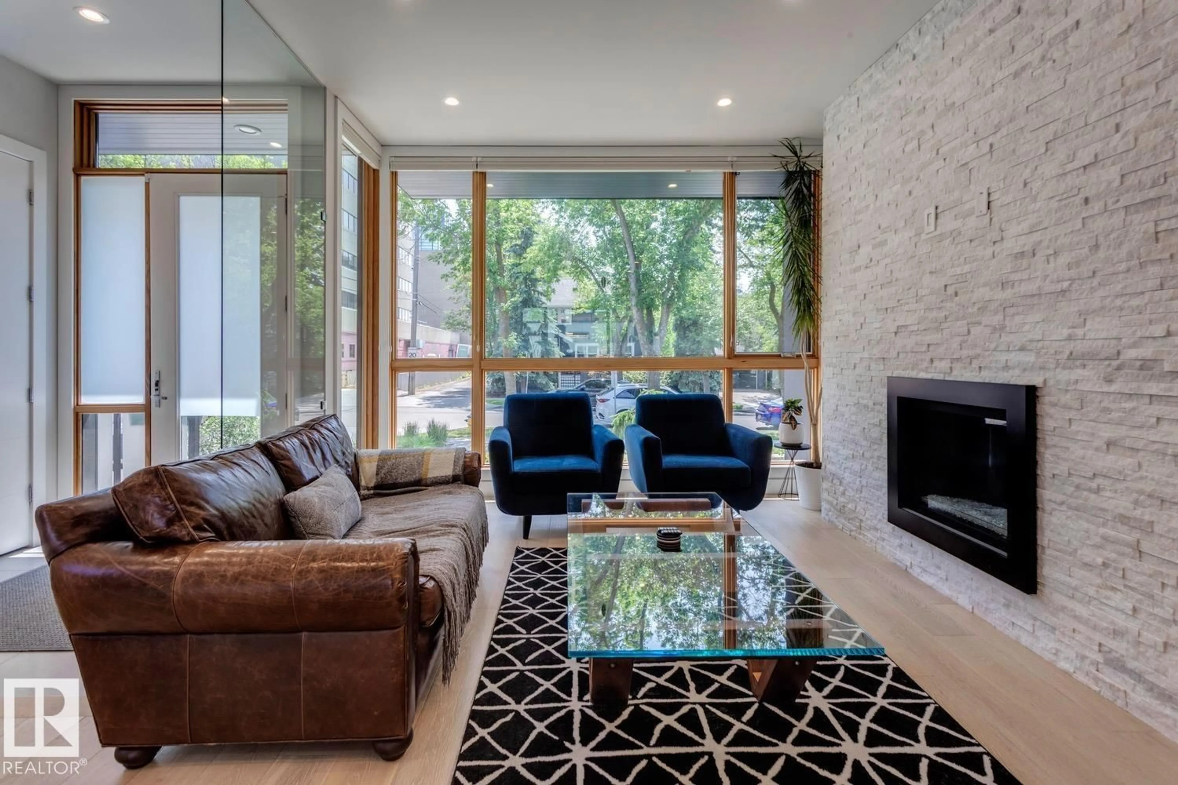 Living room with furniture, unknown for 12420 103 AV, Edmonton Alberta T5N0R3