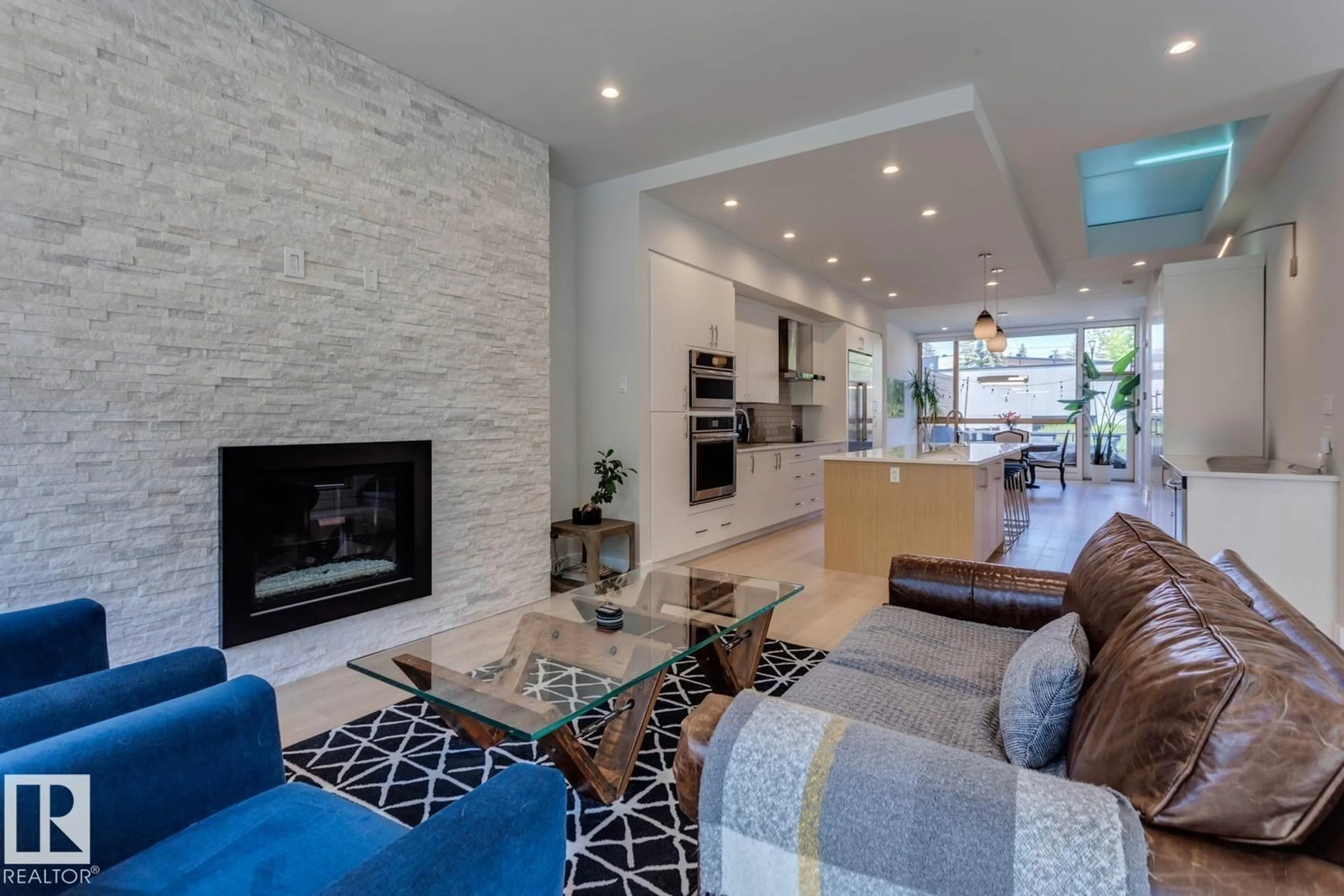 Living room with furniture, ceramic/tile floor for 12420 103 AV, Edmonton Alberta T5N0R3