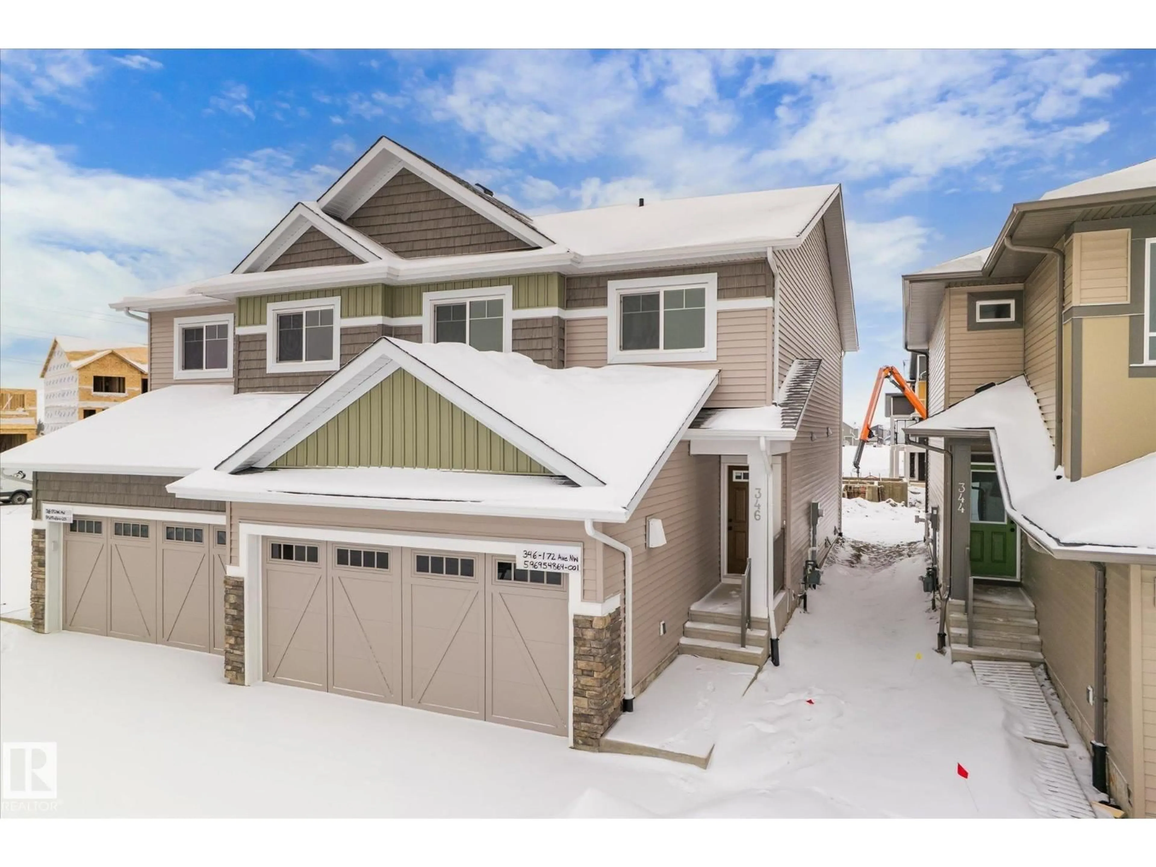 Home with vinyl exterior material, street for 346 172 AV, Edmonton Alberta T5Y4K9