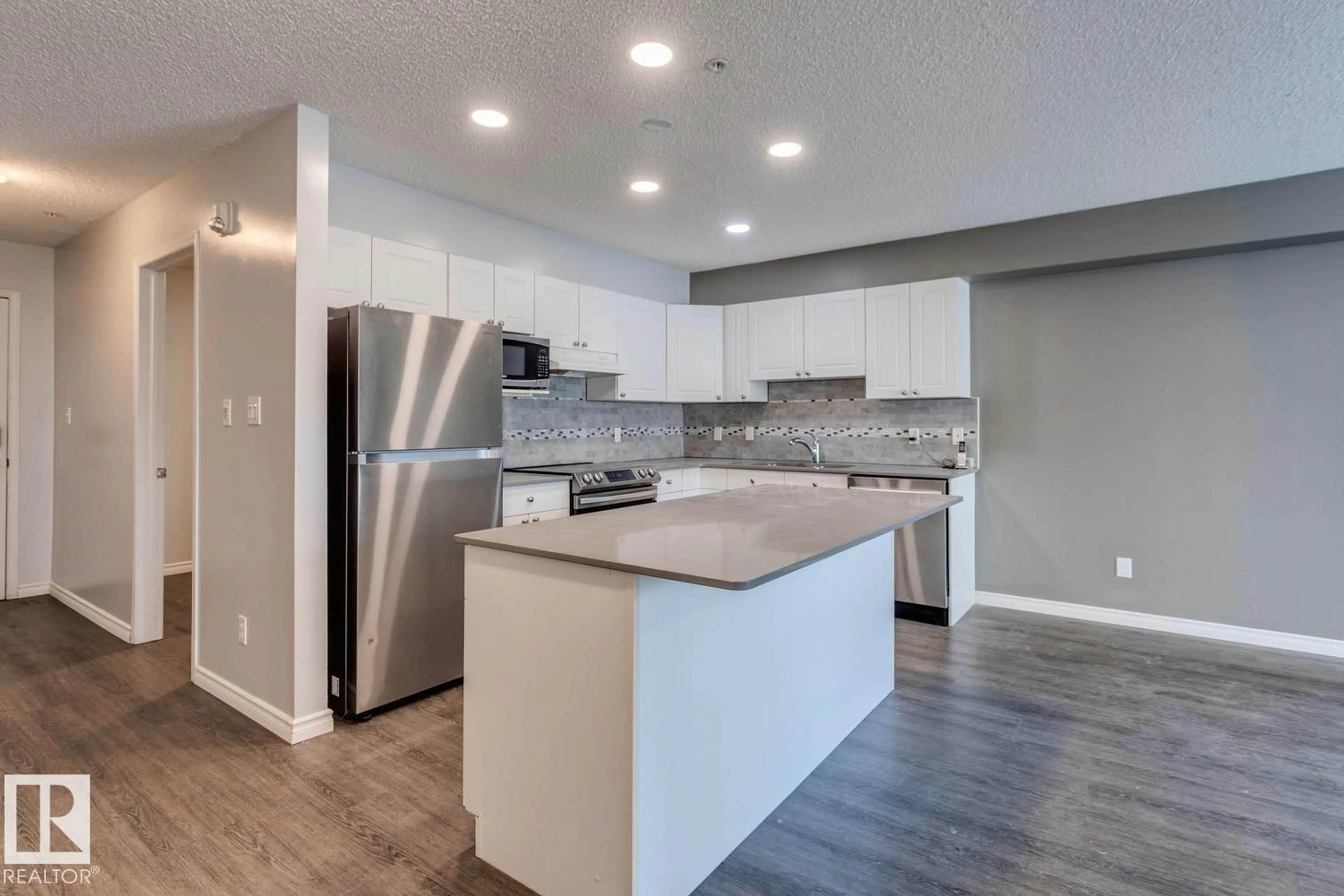 Open concept kitchen, unknown for 300 - 10311 111 ST NW, Edmonton Alberta T5K2Y8