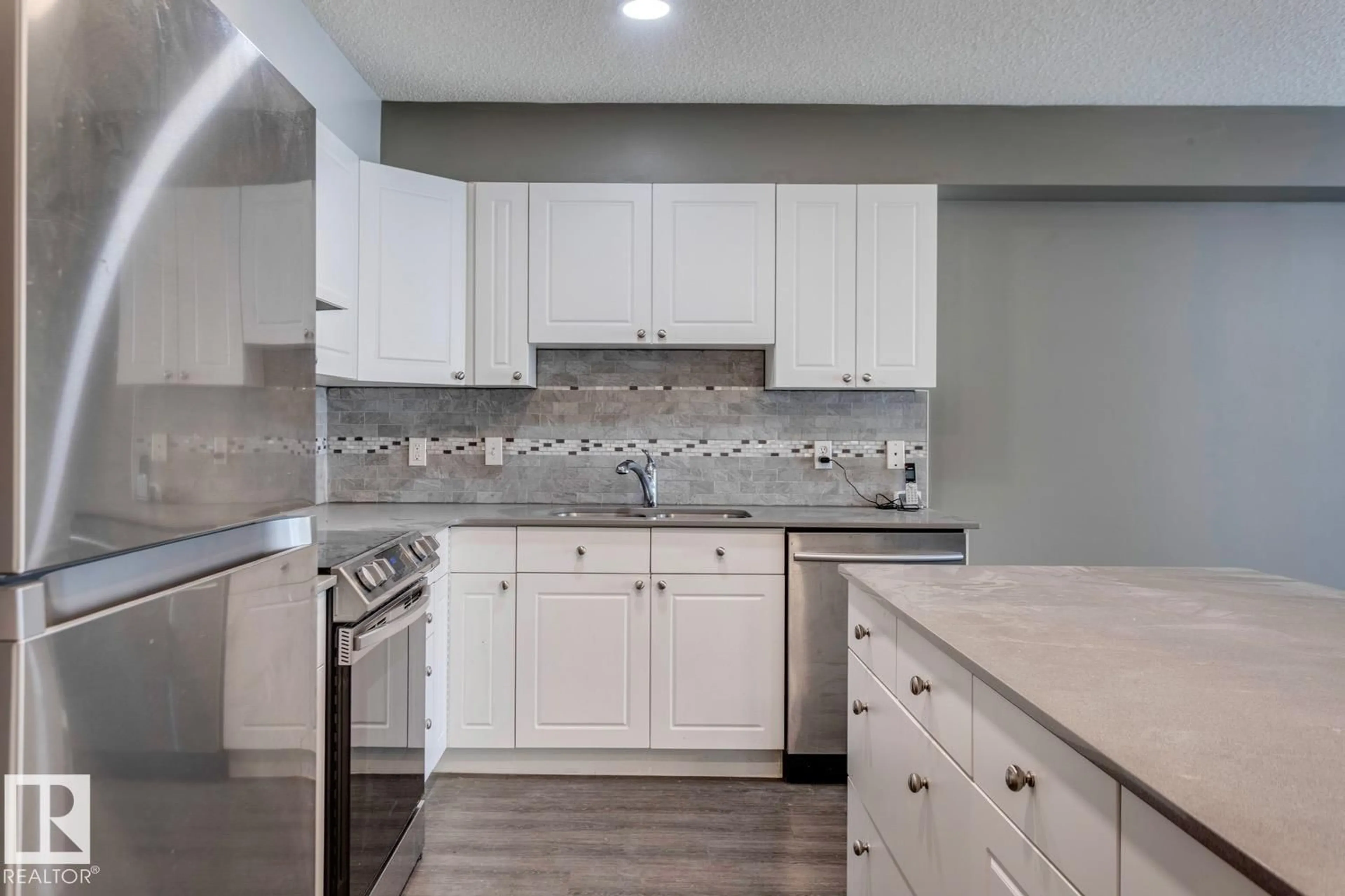 Contemporary kitchen, ceramic/tile floor for 300 - 10311 111 ST NW, Edmonton Alberta T5K2Y8
