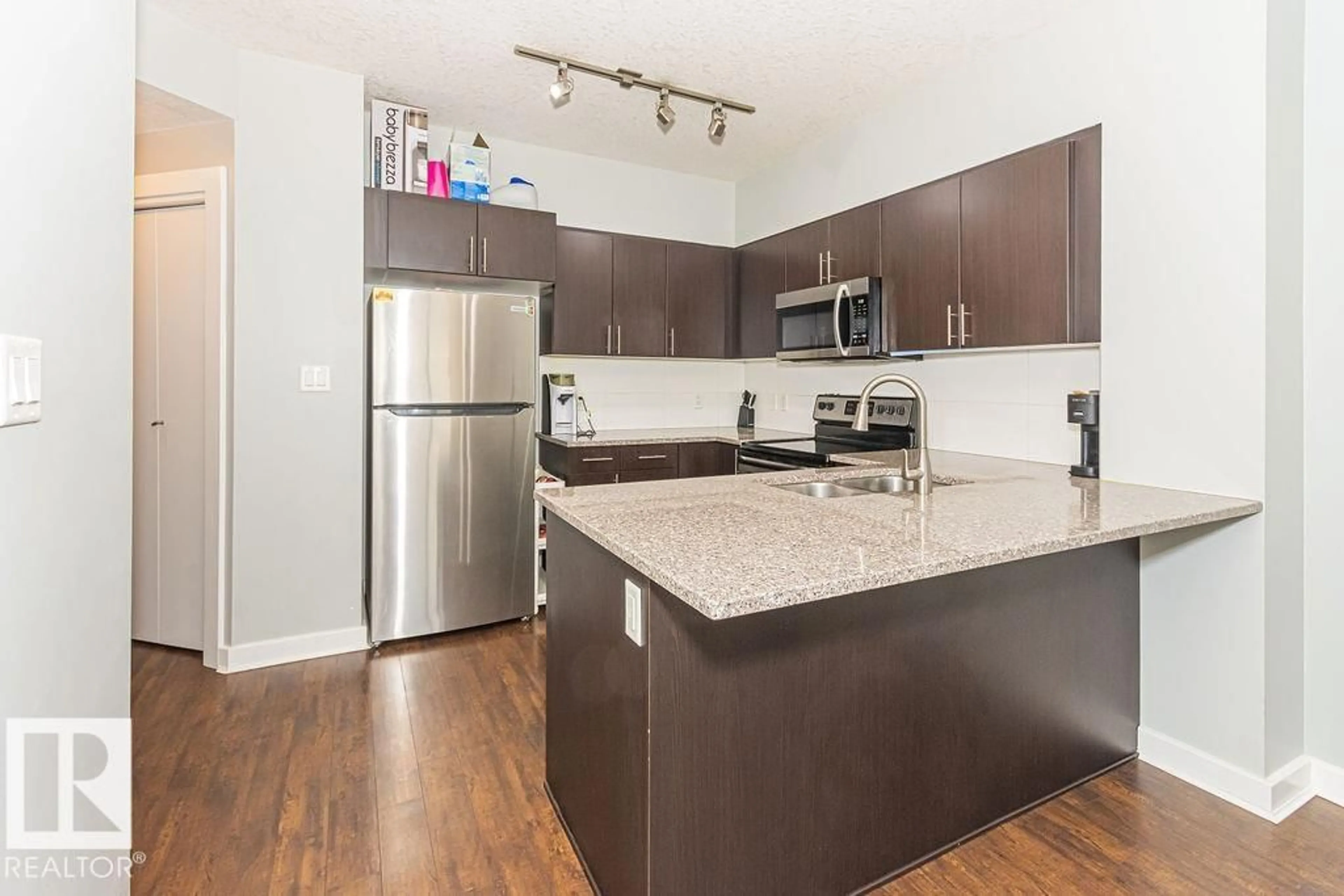 Standard kitchen, wood/laminate floor for #1404 - 10152 104 ST, Edmonton Alberta T5J0B6