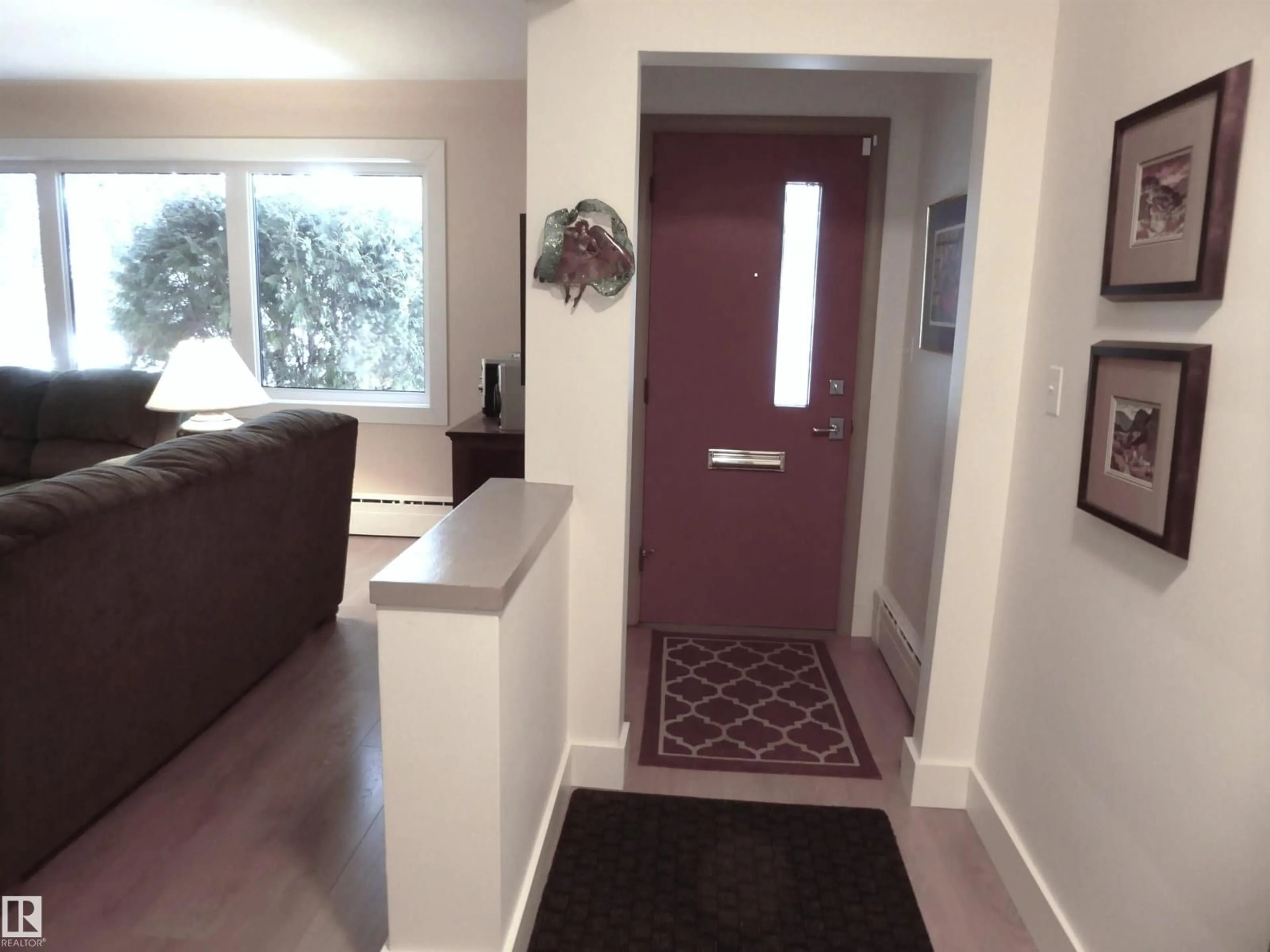 Indoor entryway for 13576 107A AV NW, Edmonton Alberta T5M2A7