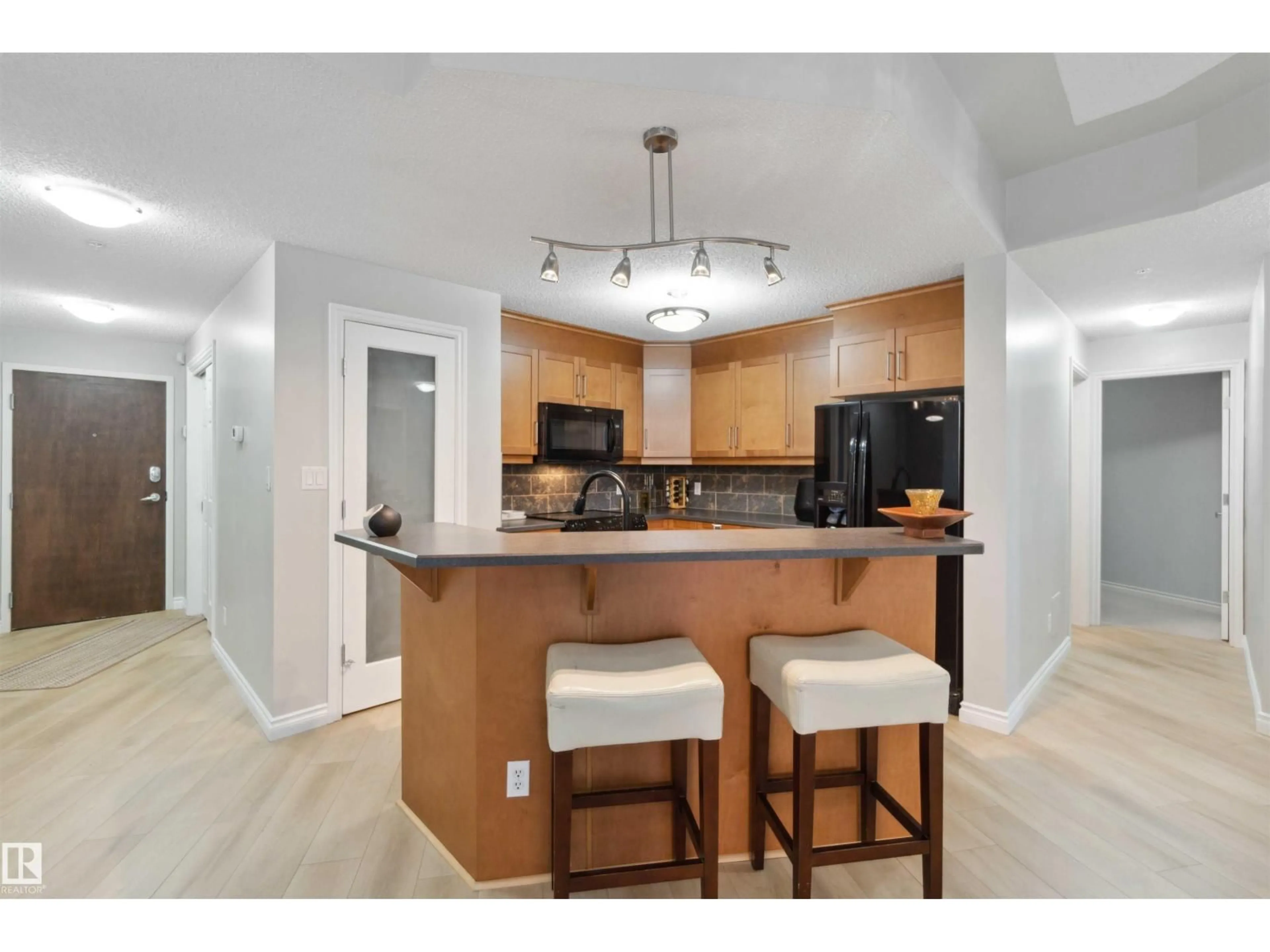 Open concept kitchen, unknown for #402 - 9020 JASPER AV, Edmonton Alberta T5H3S8