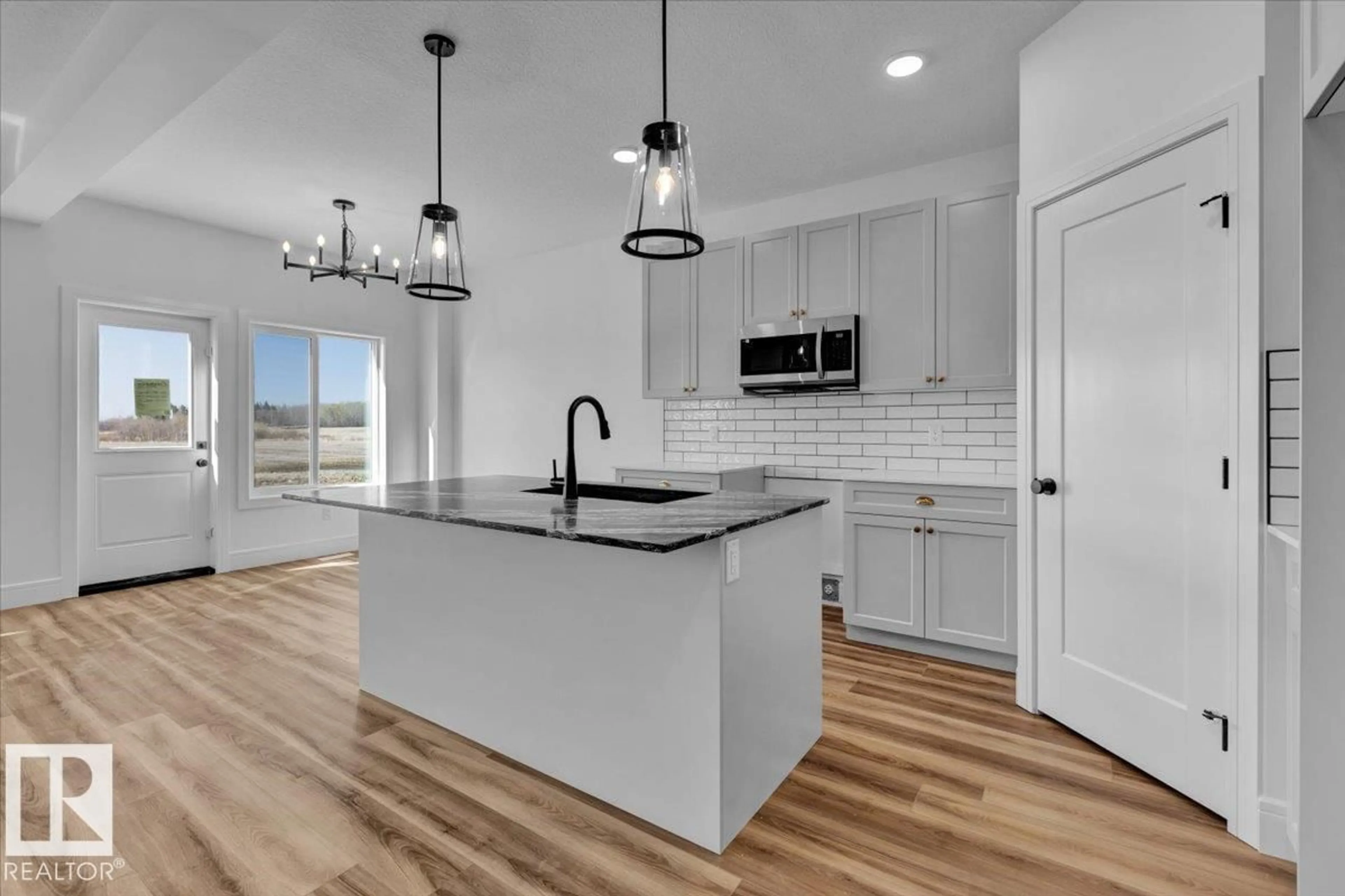 Open concept kitchen, ceramic/tile floor for 70 SUMAC CL, Fort Saskatchewan Alberta T8L0Z9