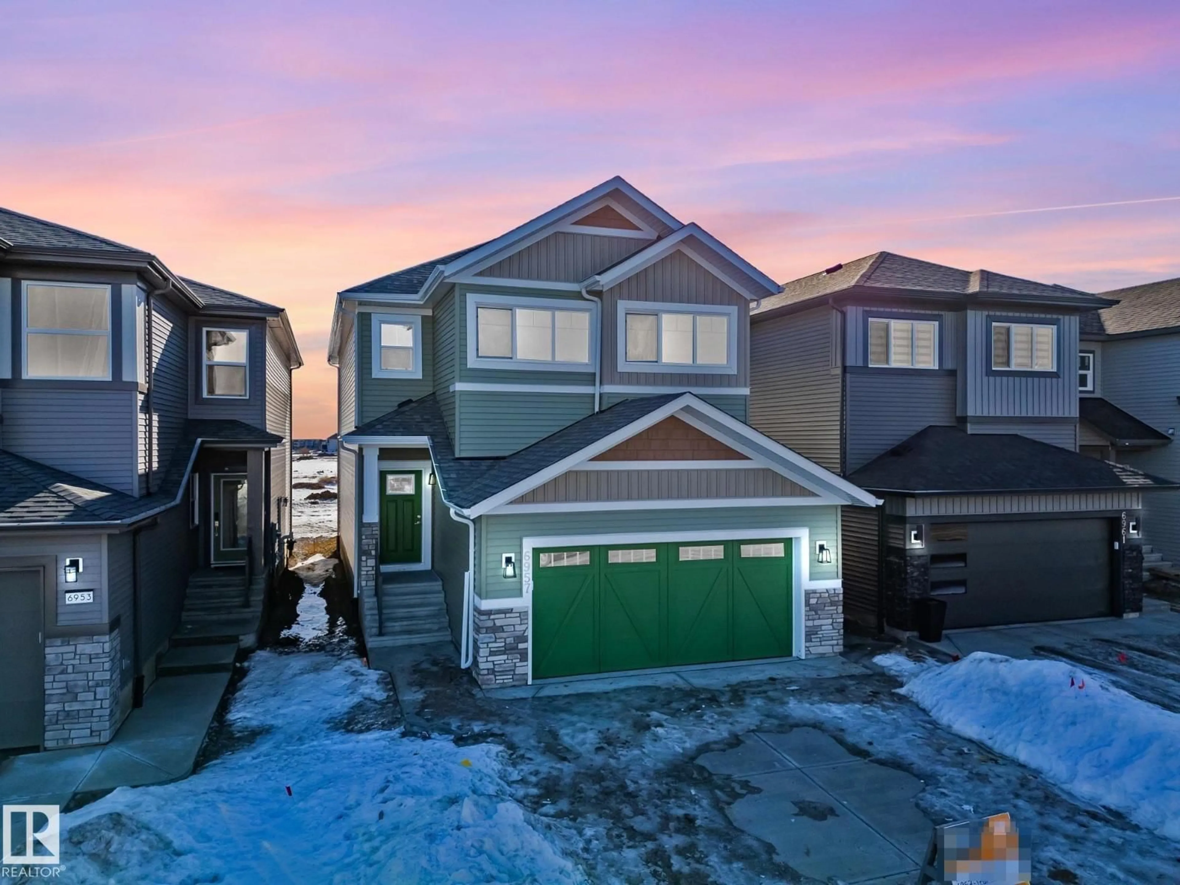 A pic from outside/outdoor area/front of a property/back of a property/a pic from drone, street for 6957 176A AV, Edmonton Alberta T5Z0X8