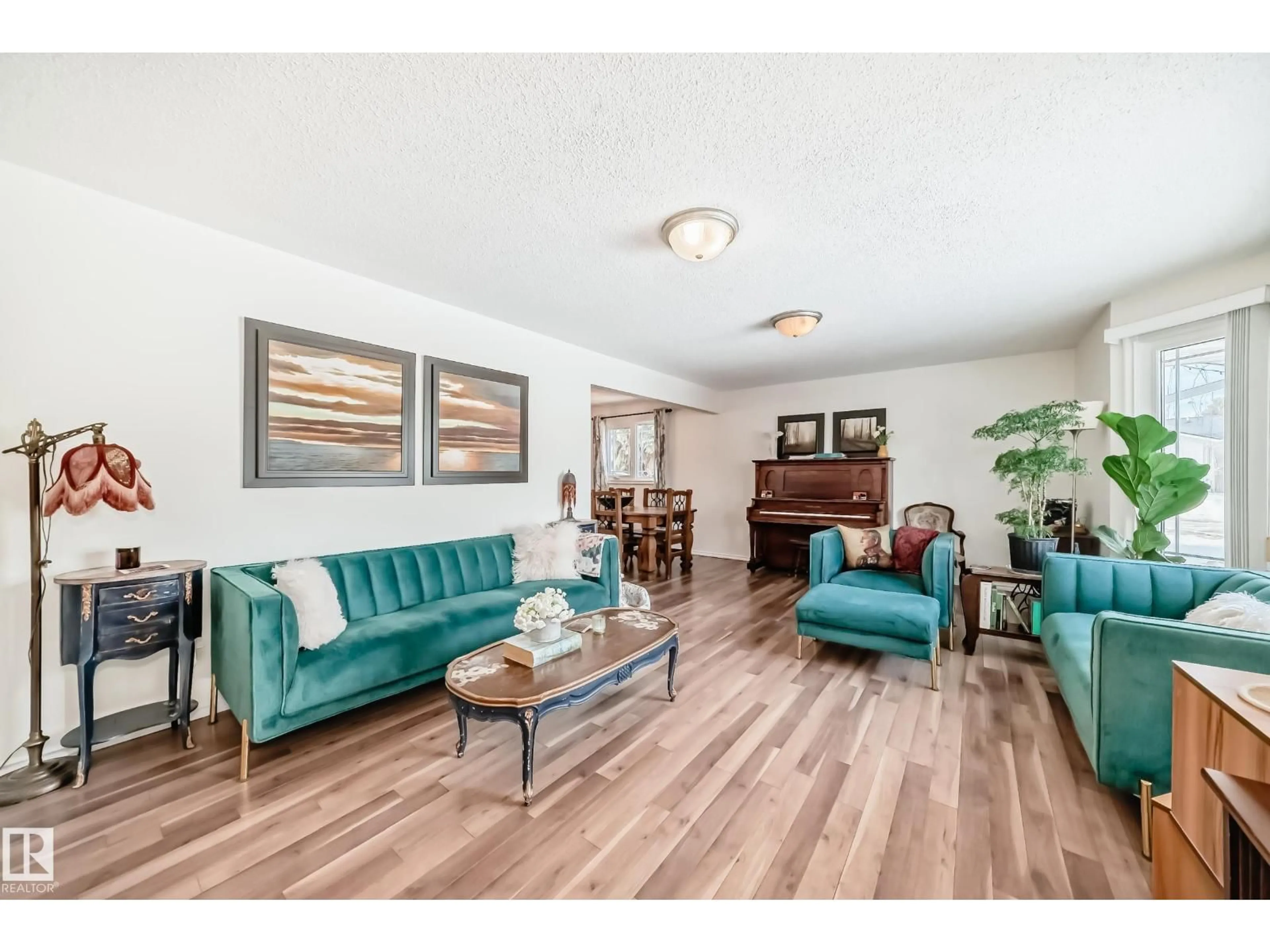 Living room with furniture, wood/laminate floor for 17427 78 AV, Edmonton Alberta T5T0A9