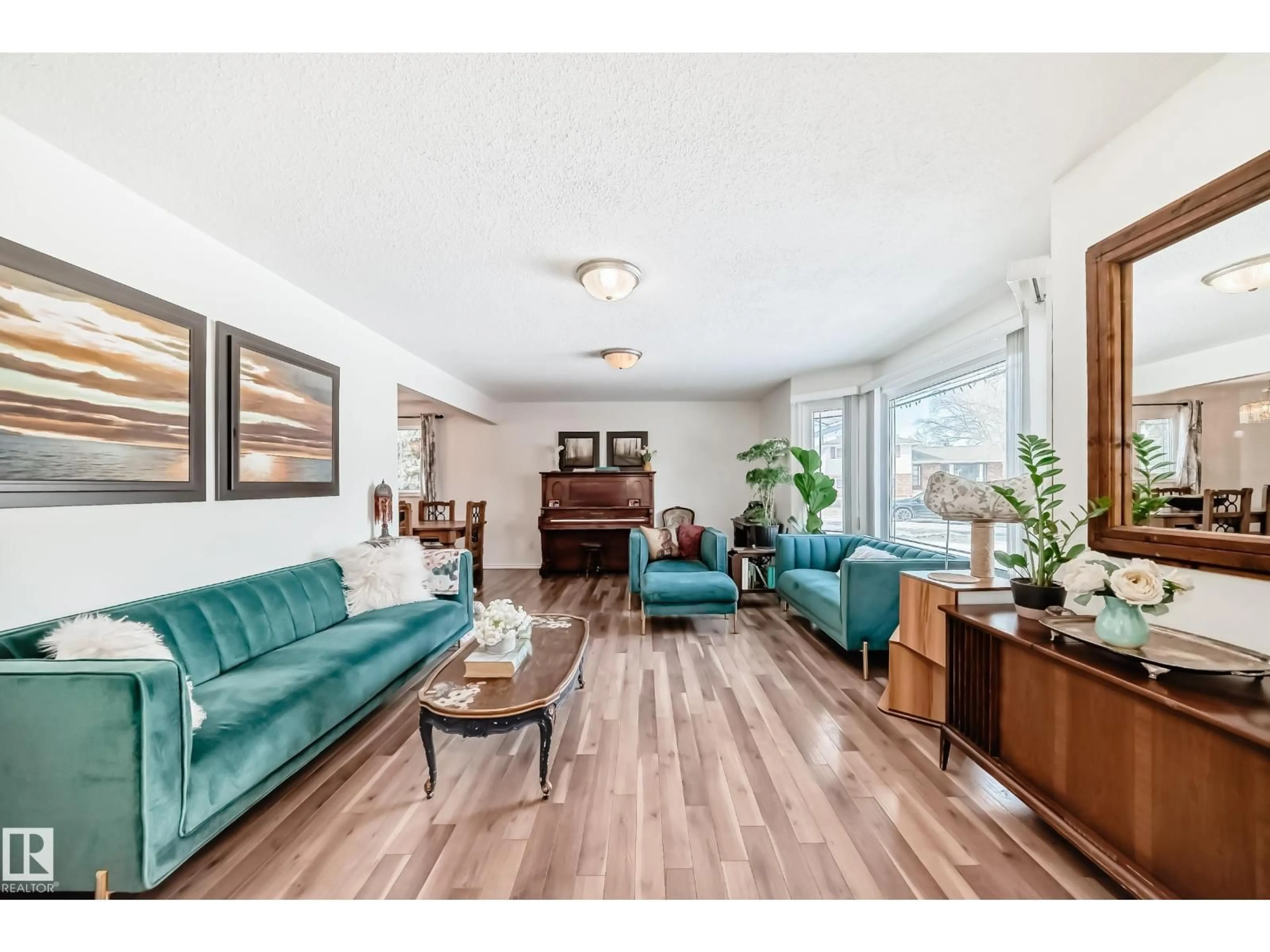 Living room with furniture, wood/laminate floor for 17427 78 AV, Edmonton Alberta T5T0A9