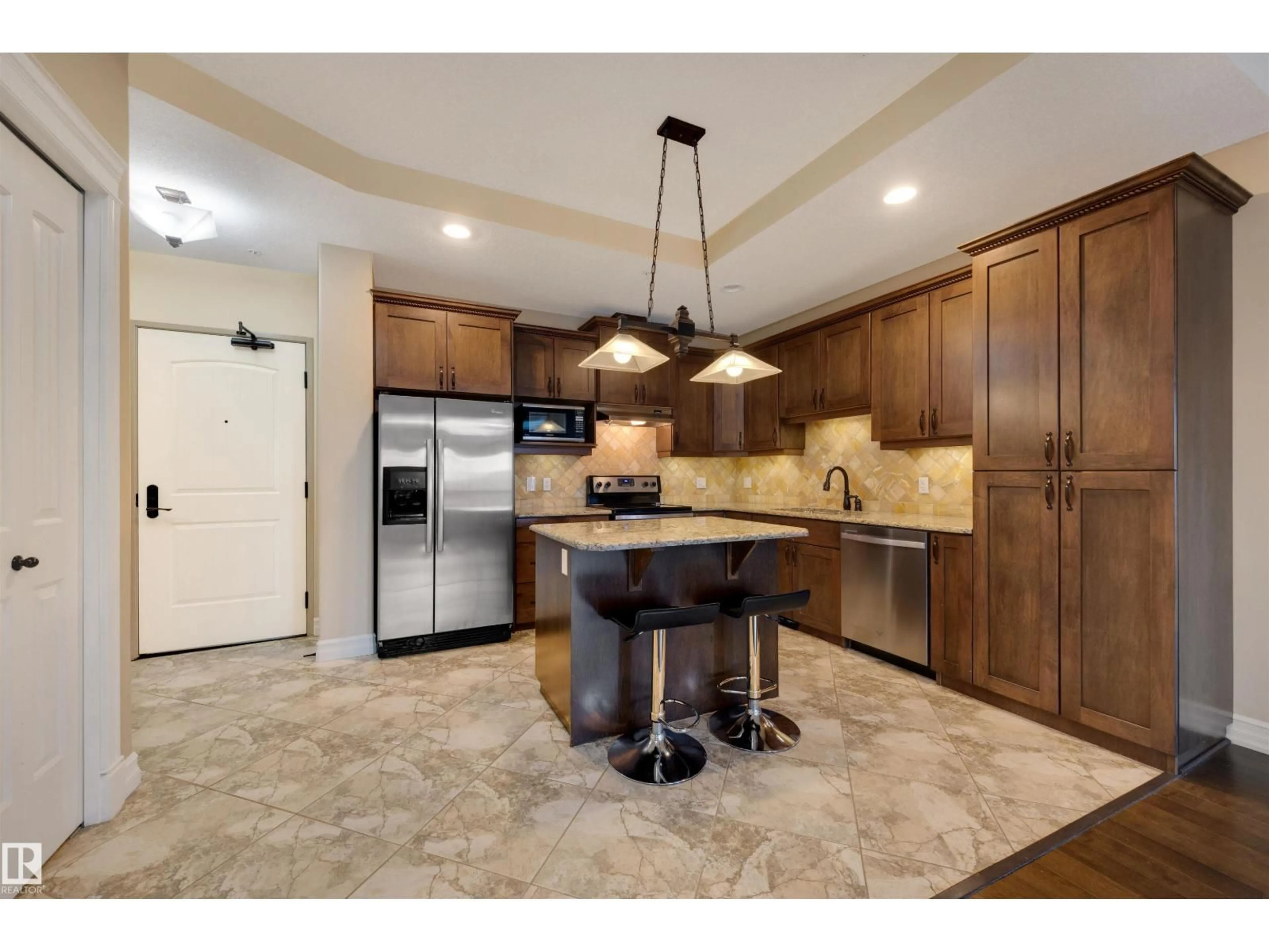 Open concept kitchen, ceramic/tile floor for 906 - 10142 111 ST NW, Edmonton Alberta T5K1K6