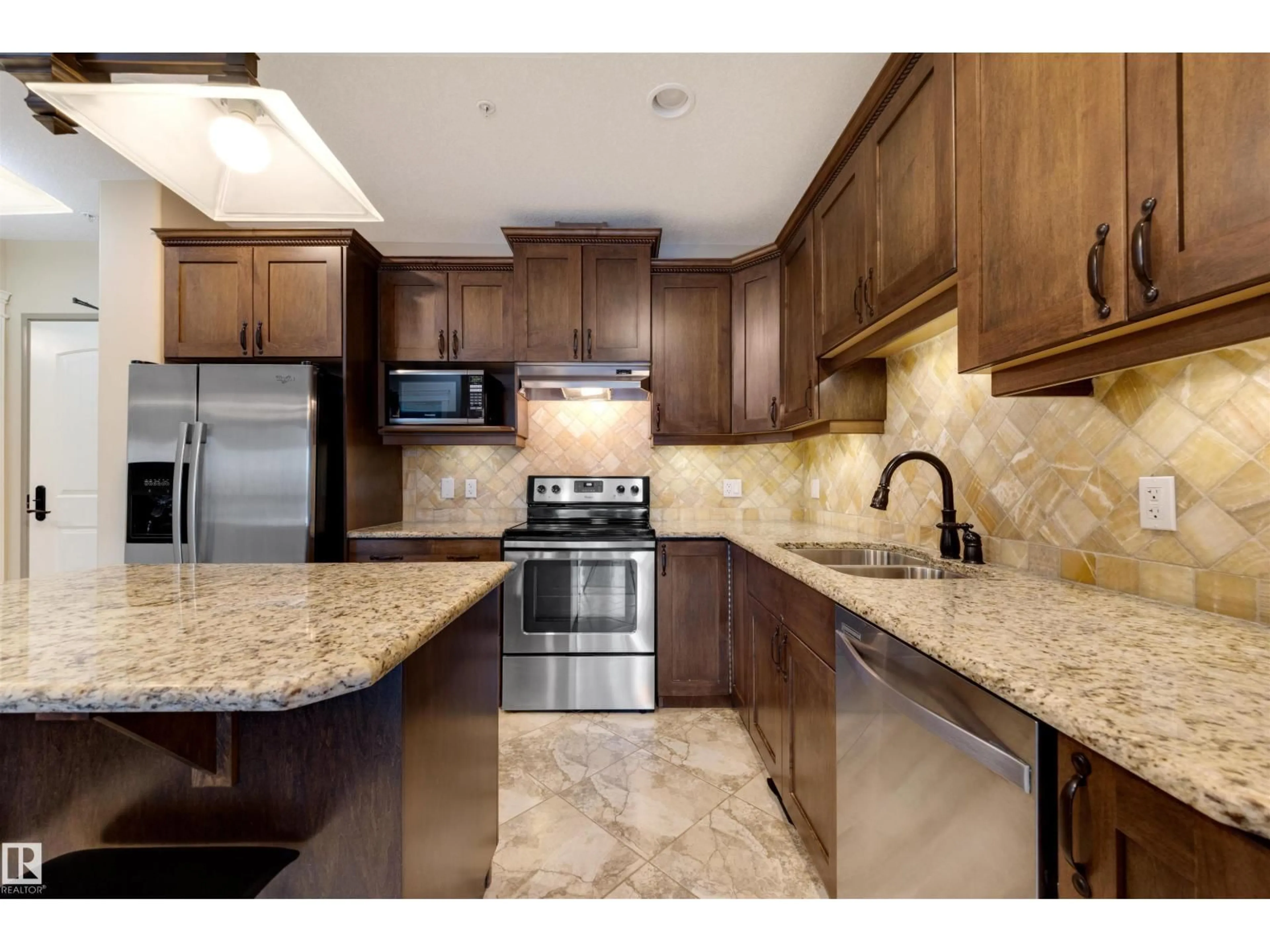 Open concept kitchen, ceramic/tile floor for 906 - 10142 111 ST NW, Edmonton Alberta T5K1K6