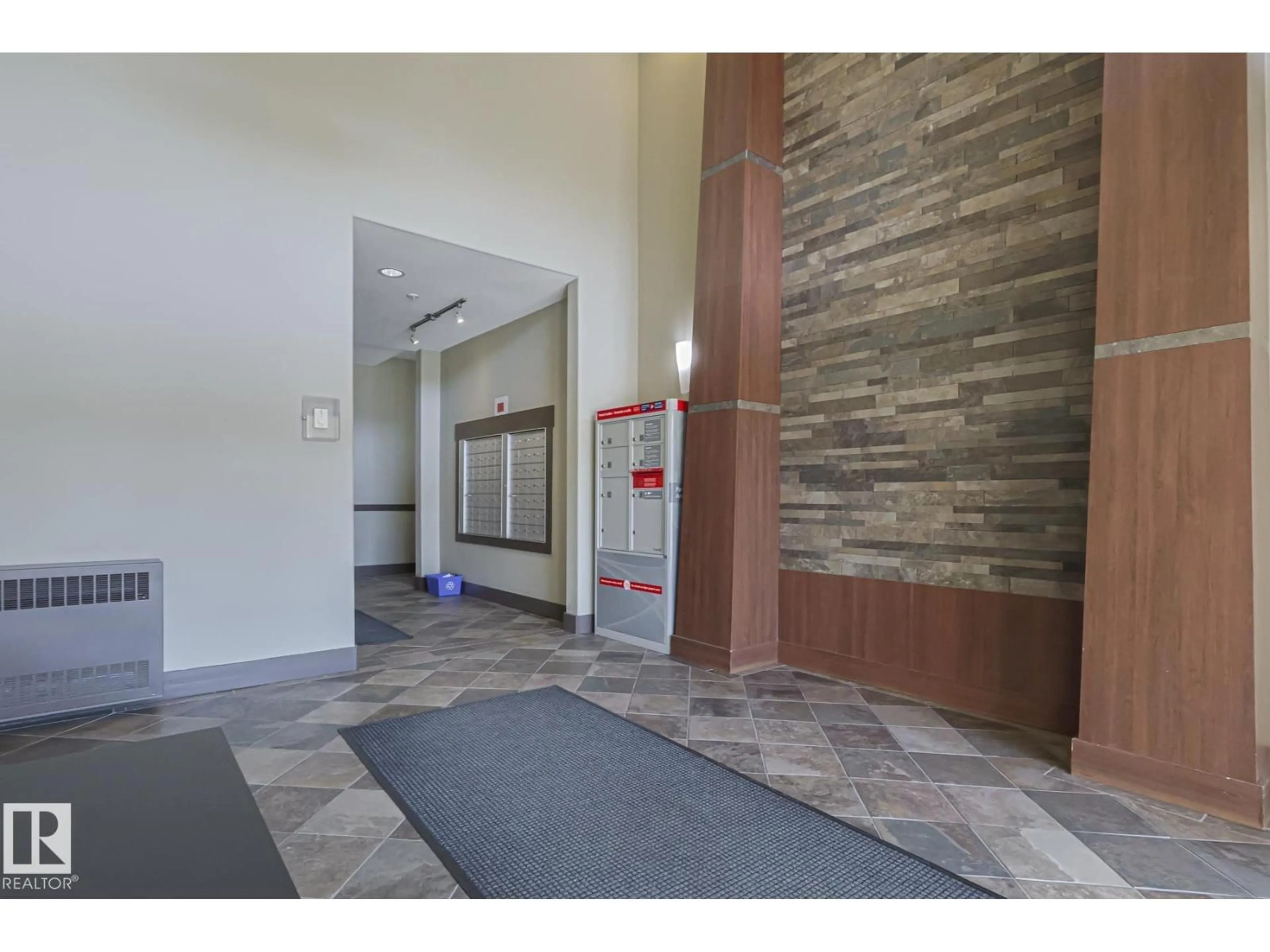 Indoor foyer for #105 - 2503 HANNA CR, Edmonton Alberta T6R0H1