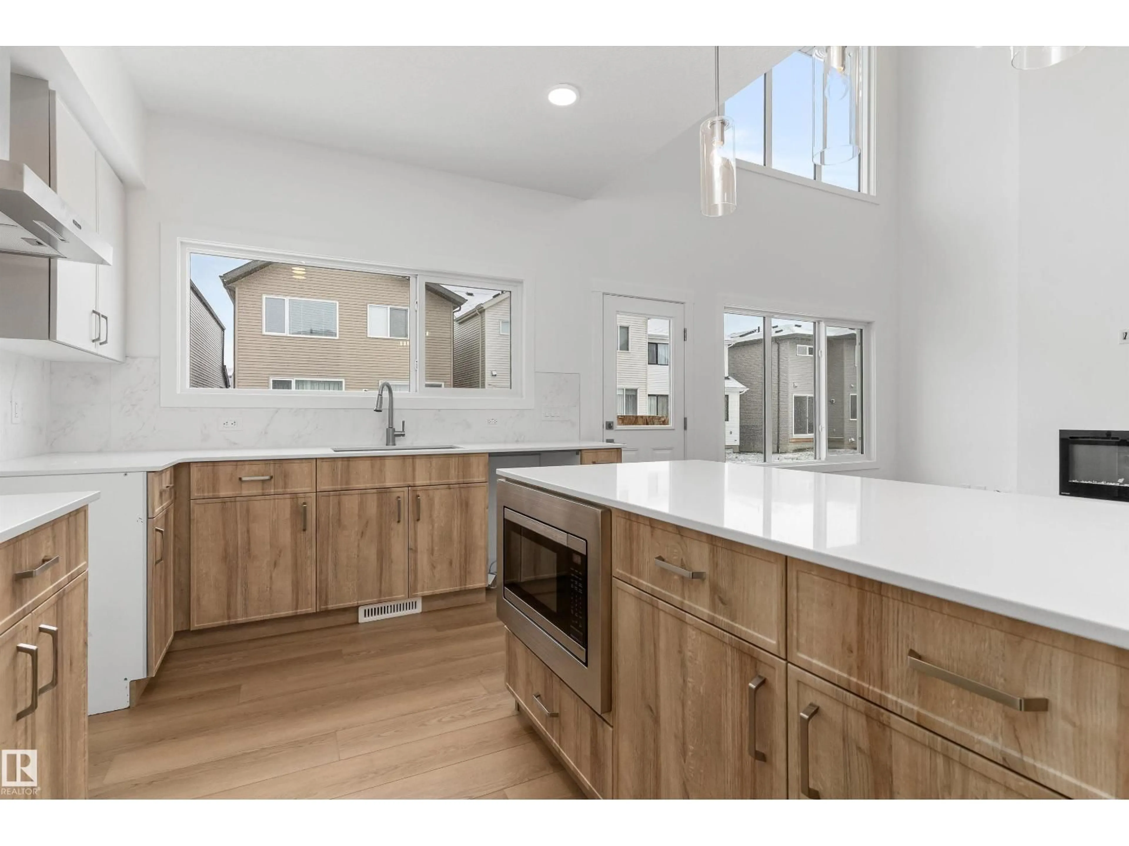 Open concept kitchen, unknown for NW - 2209 194A ST, Edmonton Alberta T6M3J3