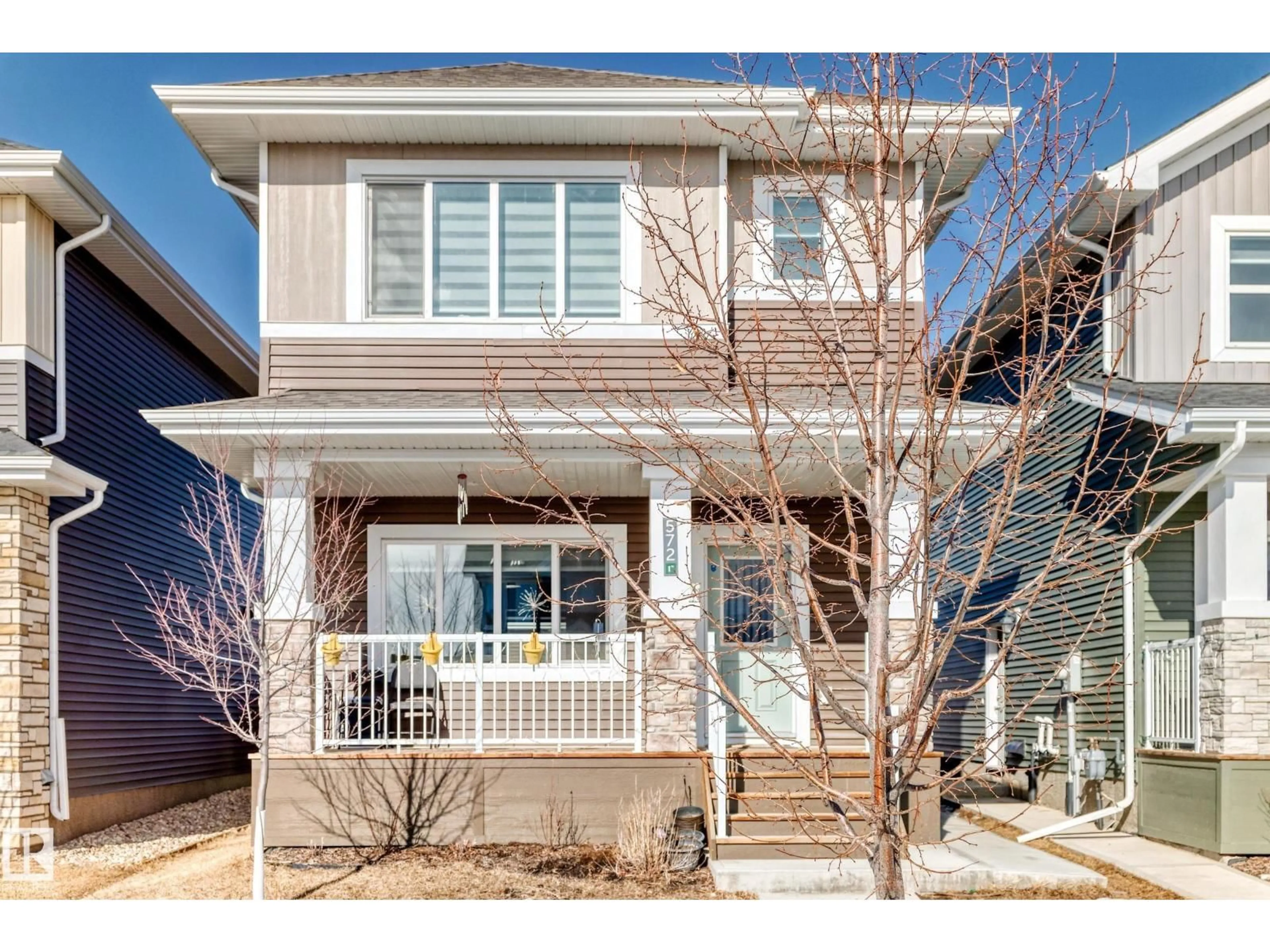 Home with vinyl exterior material, street for 572 GLENRIDDING RAVINE DR, Edmonton Alberta T6W4P1