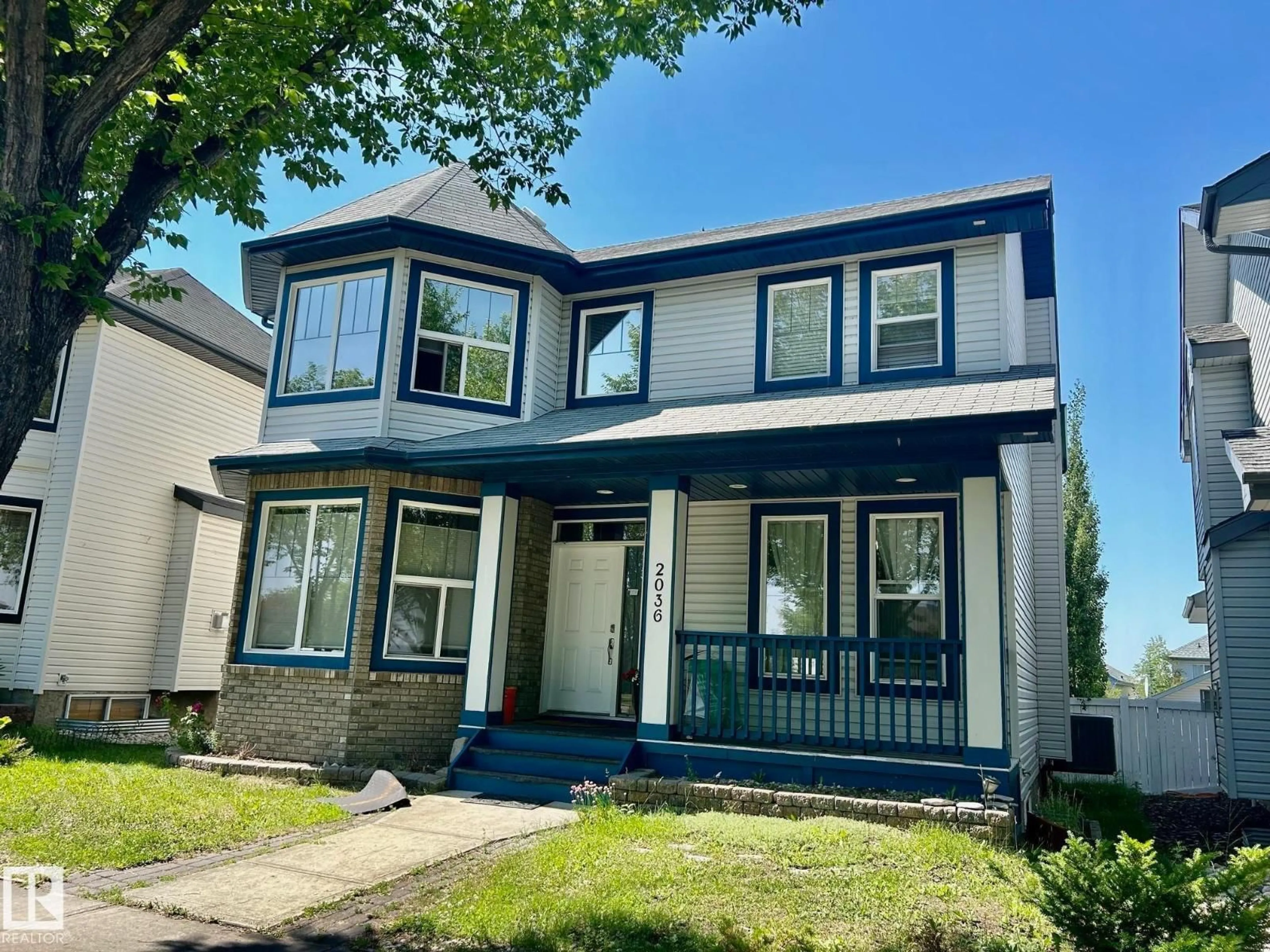 Home with vinyl exterior material, street for NW - 2036 TOWNE CENTRE BV, Edmonton Alberta T6R3M7