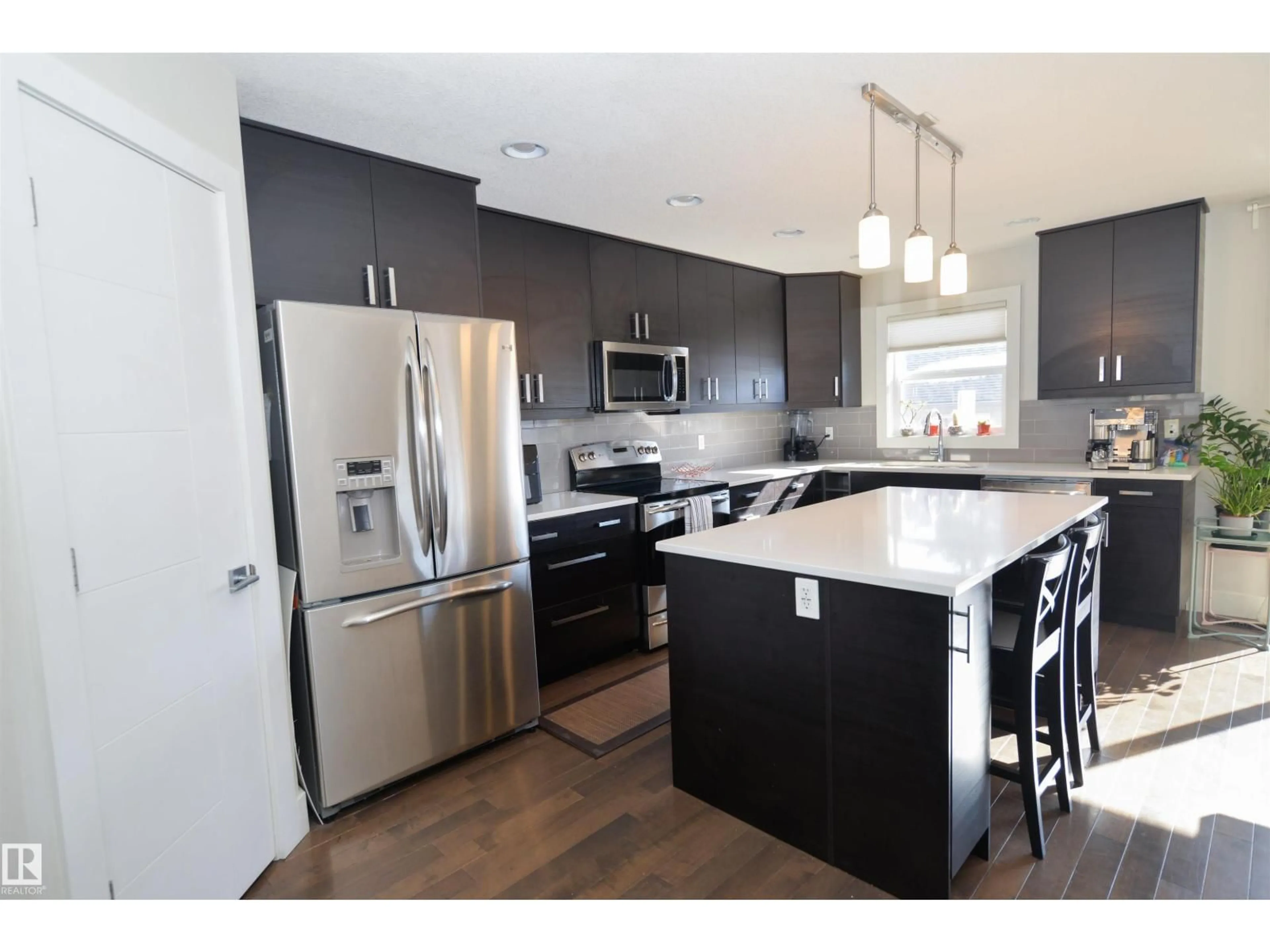 Open concept kitchen, unknown for 10433 70 AV, Edmonton Alberta T6H2E7