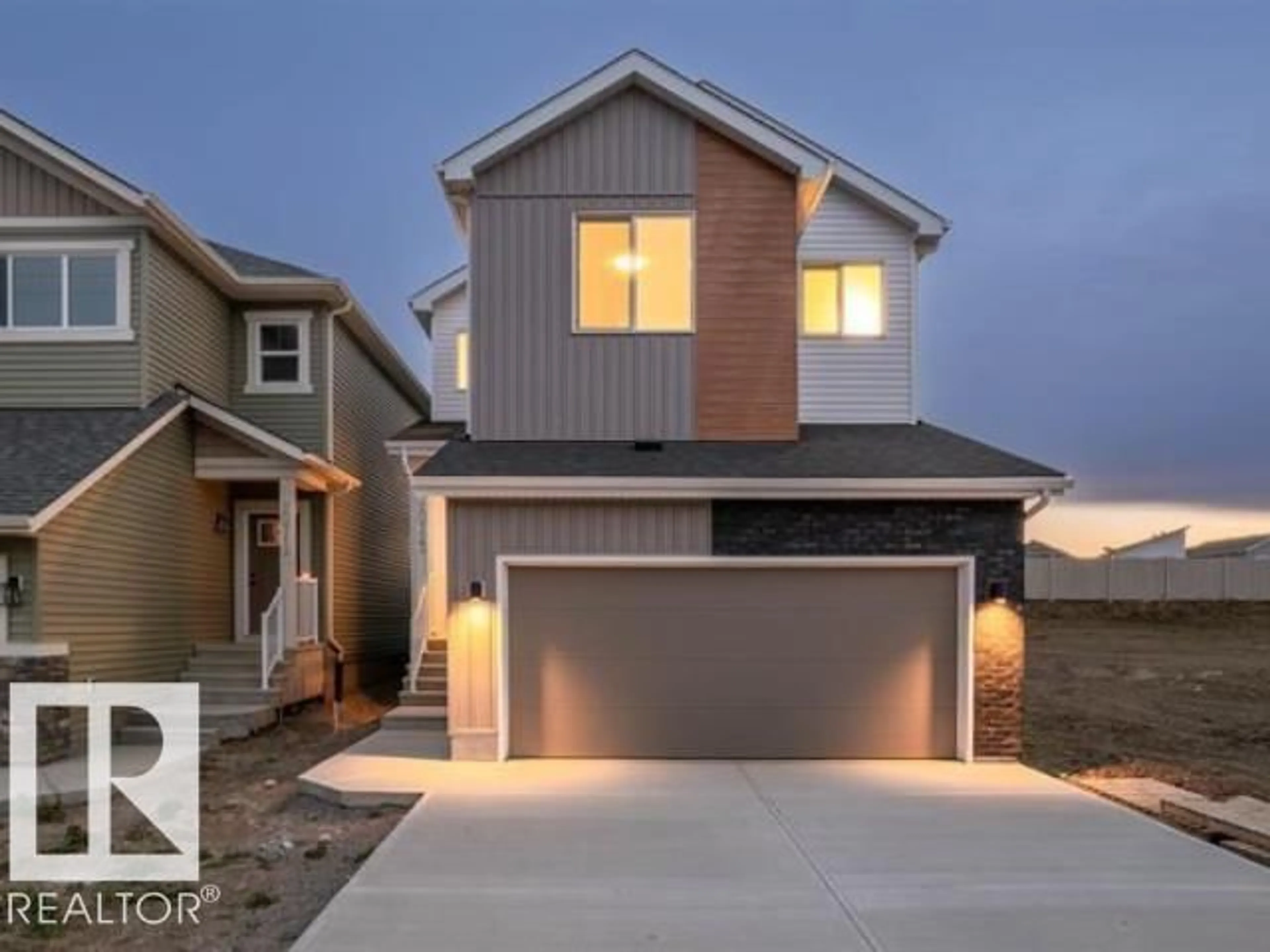 Home with vinyl exterior material, street for 20723 24 AV, Edmonton Alberta T6M2C4