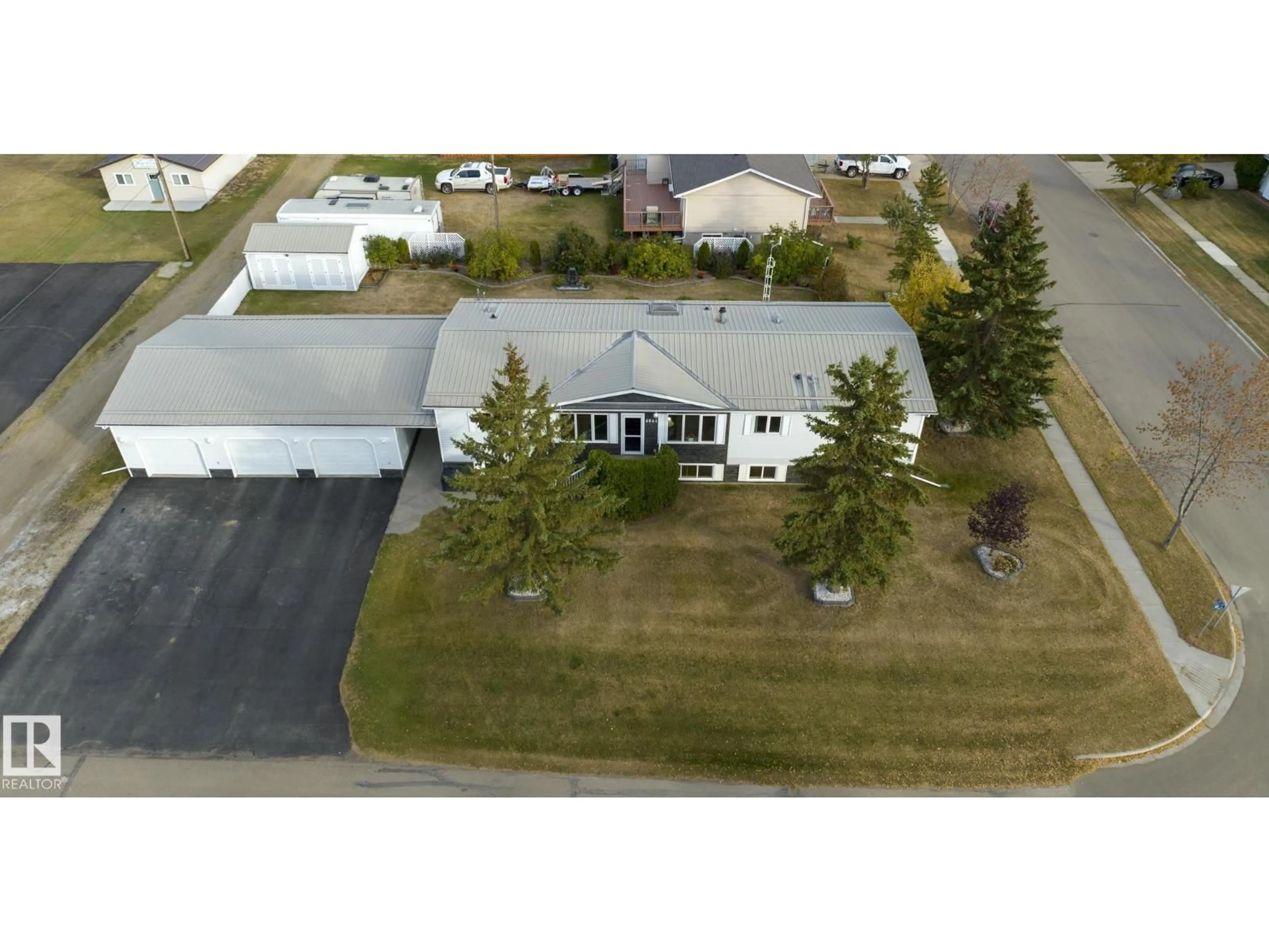A pic from outside/outdoor area/front of a property/back of a property/a pic from drone, street for 4844 54 AV, Ryley Alberta T0B4A0