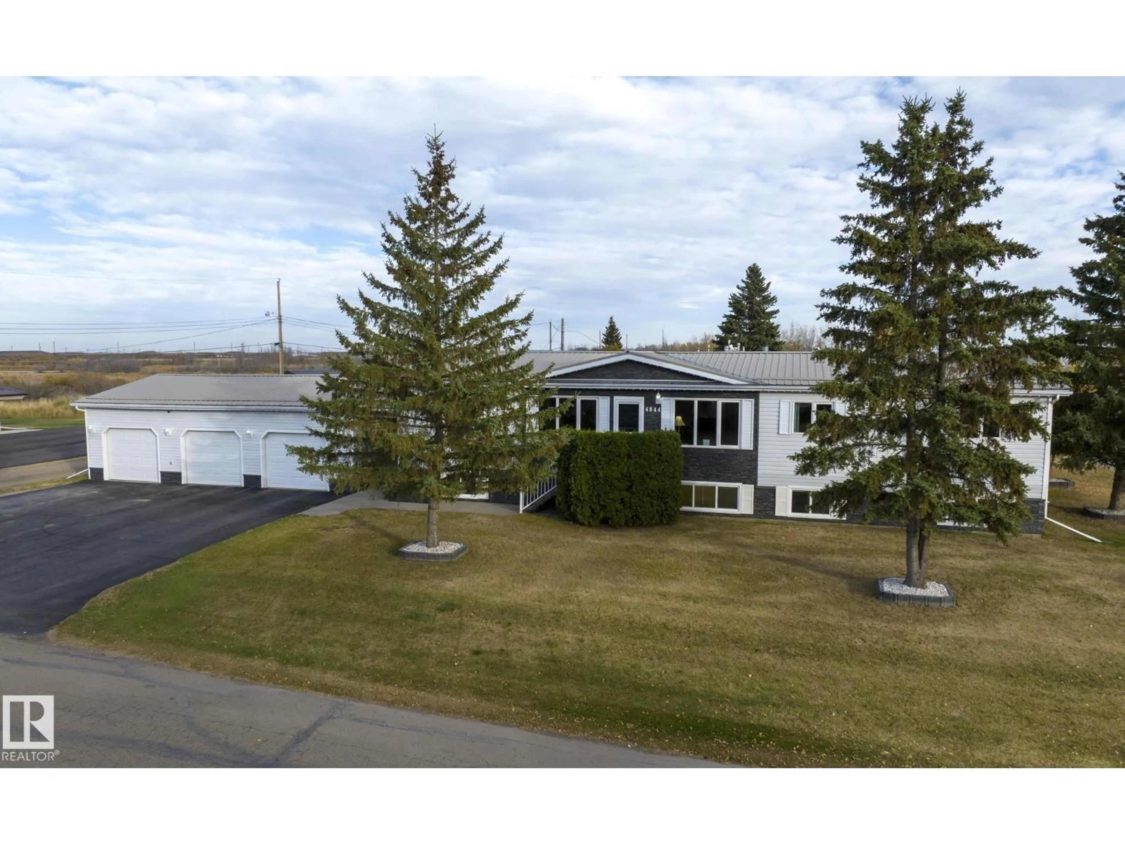 A pic from outside/outdoor area/front of a property/back of a property/a pic from drone, water/lake/river/ocean view for 4844 54 AV, Ryley Alberta T0B4A0