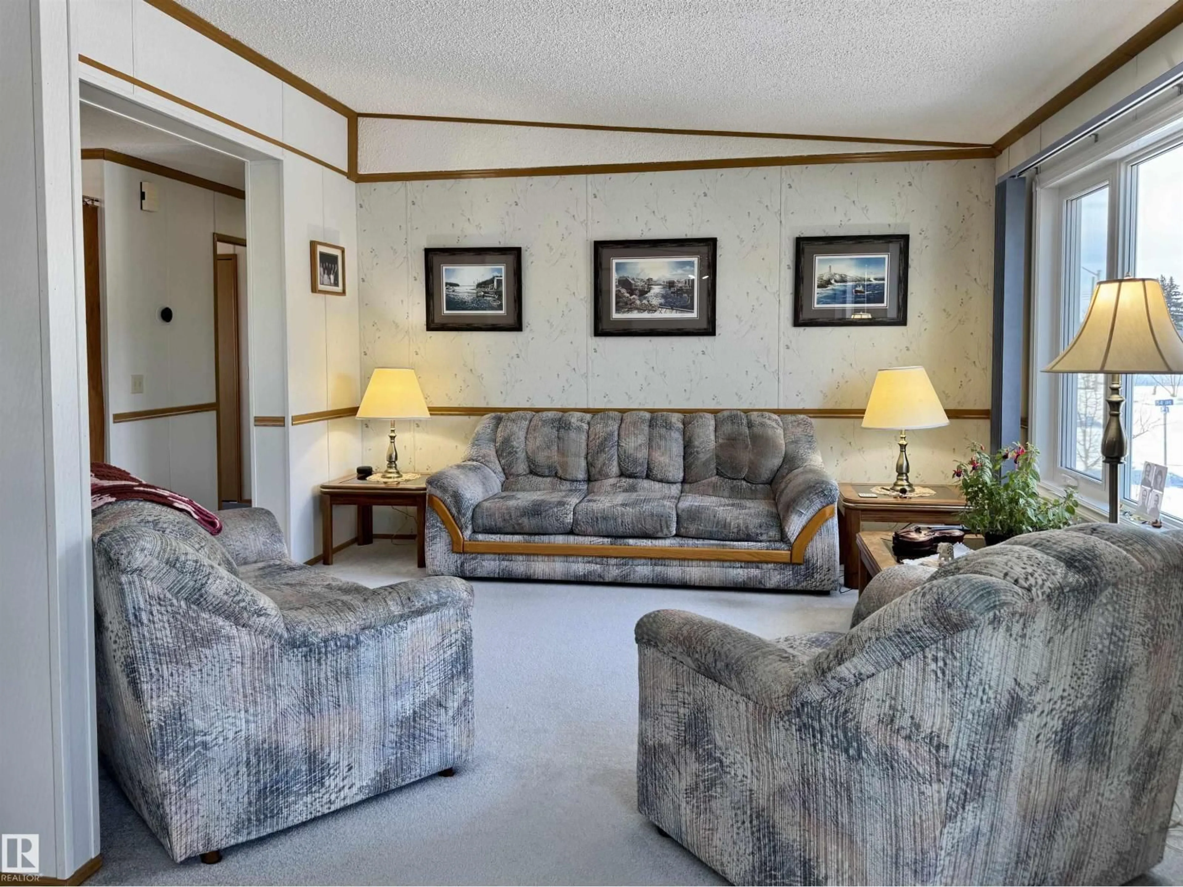 Living room with furniture, unknown for 4844 54 AV, Ryley Alberta T0B4A0