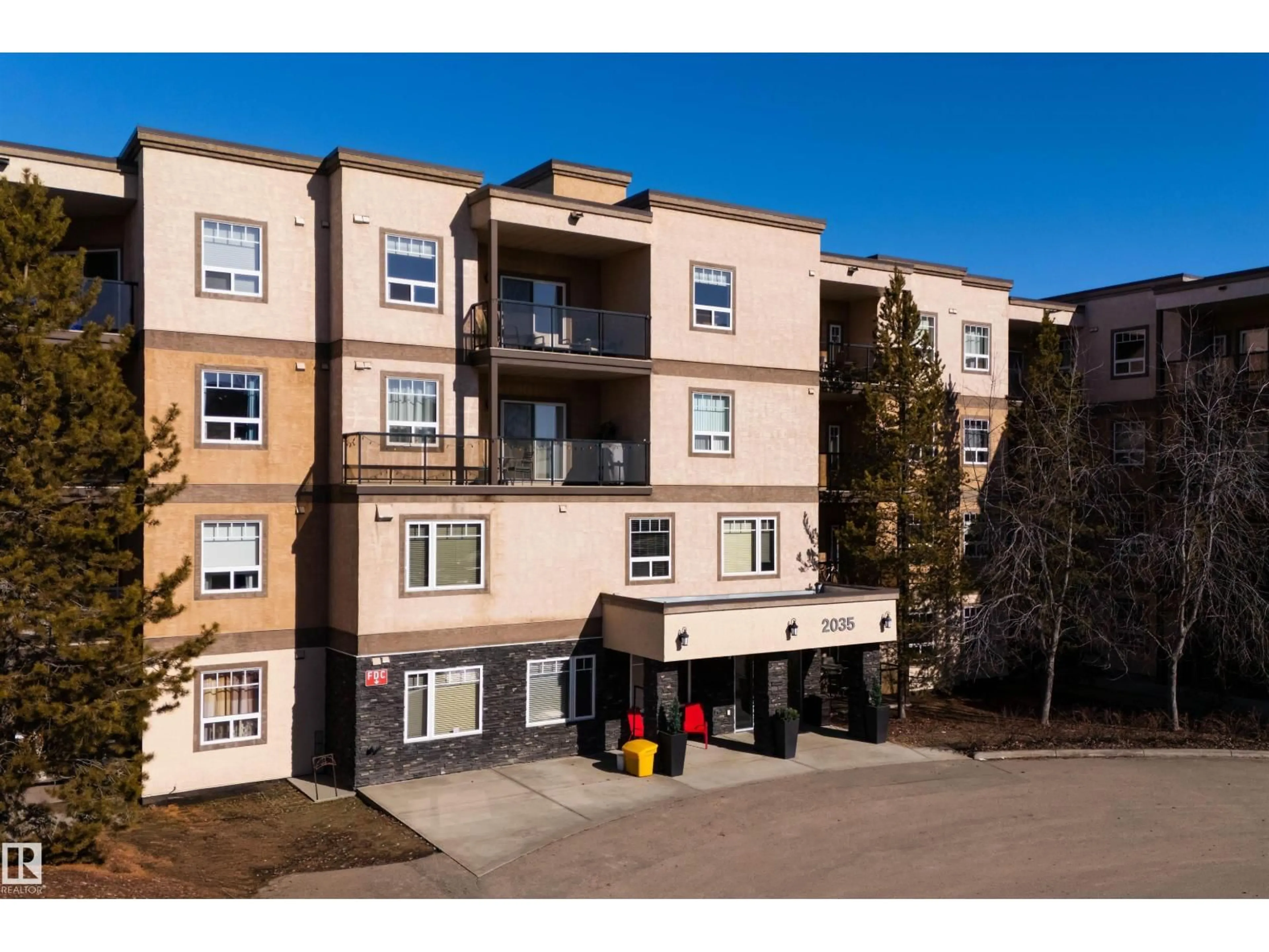 A pic from outside/outdoor area/front of a property/back of a property/a pic from drone, building for #103 - 2035 GRANTHAM CT, Edmonton Alberta T5T3X4