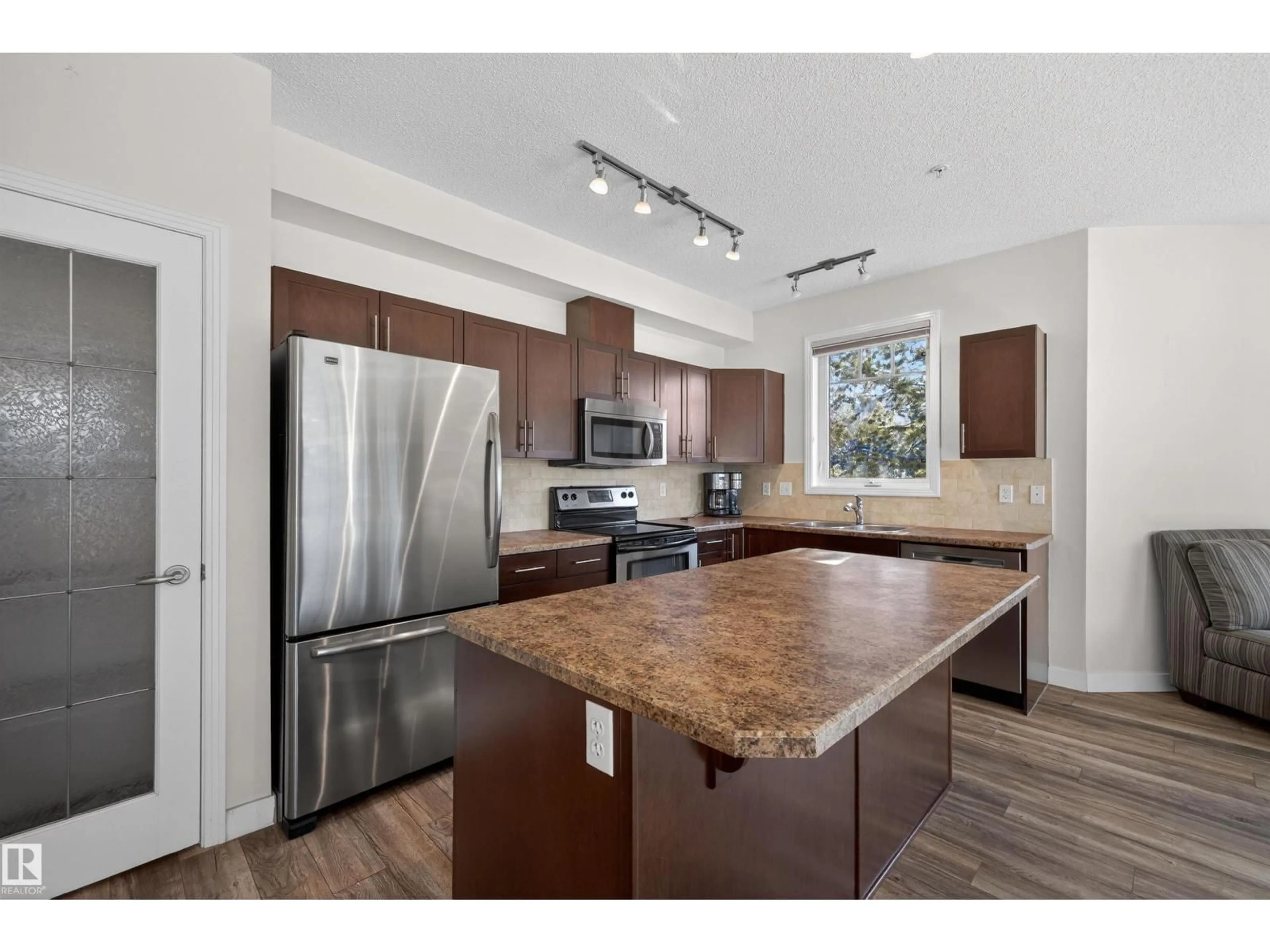 Open concept kitchen, unknown for #103 - 2035 GRANTHAM CT, Edmonton Alberta T5T3X4